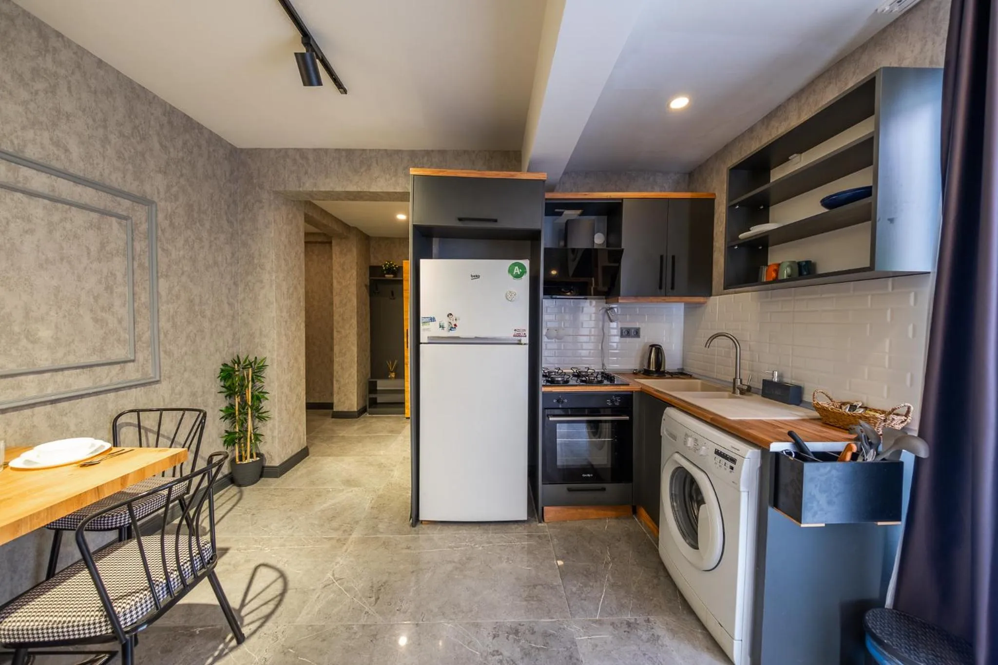 Kitchen or kitchenette in Mrt Suites Lara