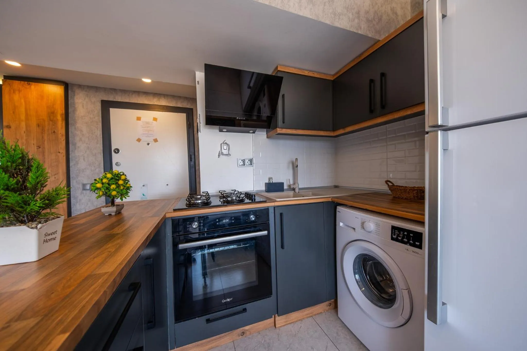 Kitchen or kitchenette in Mrt Suites Lara