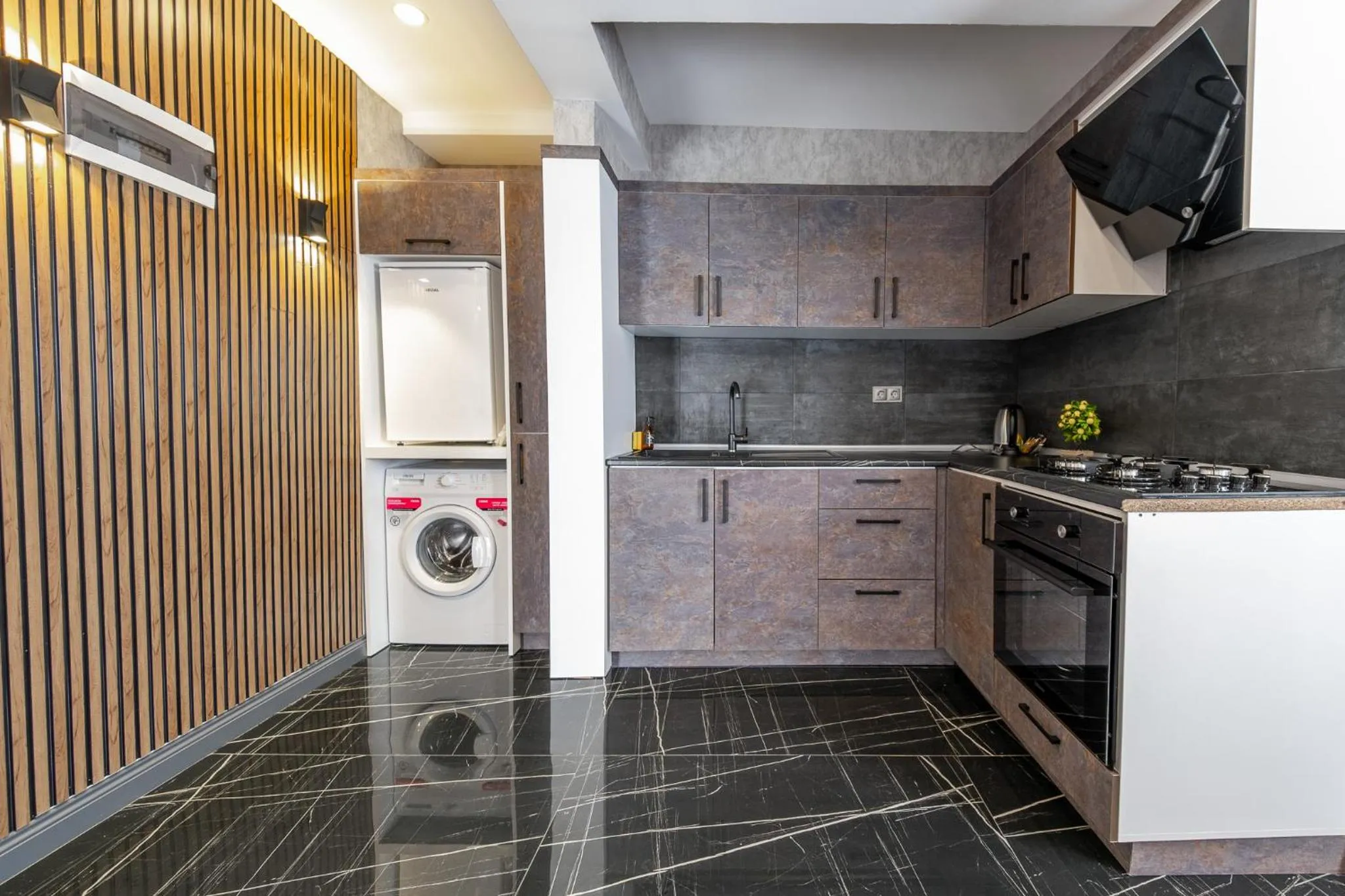 Kitchen or kitchenette in Mrt Suites Lara