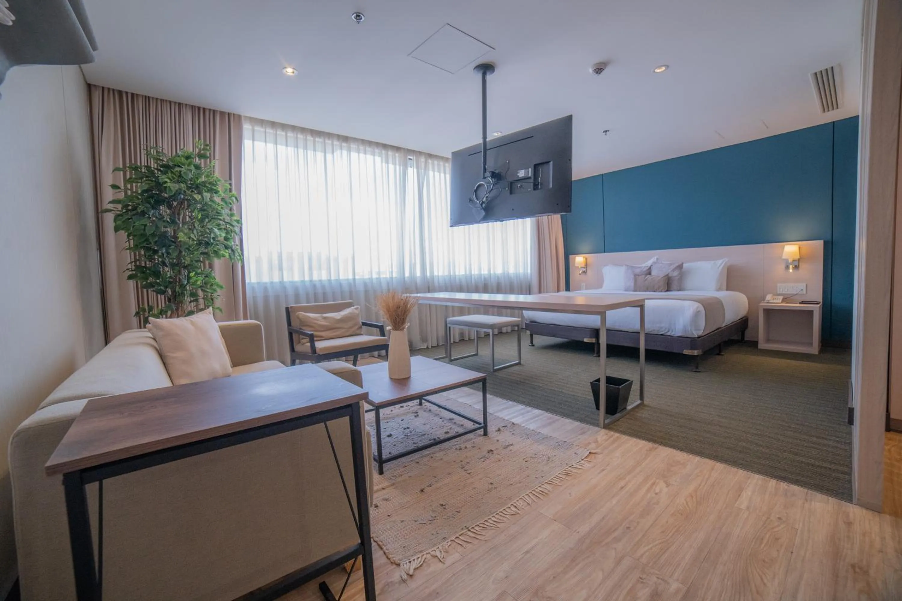 Living room, Bed in Liv Zona G Hotel By Sarasti