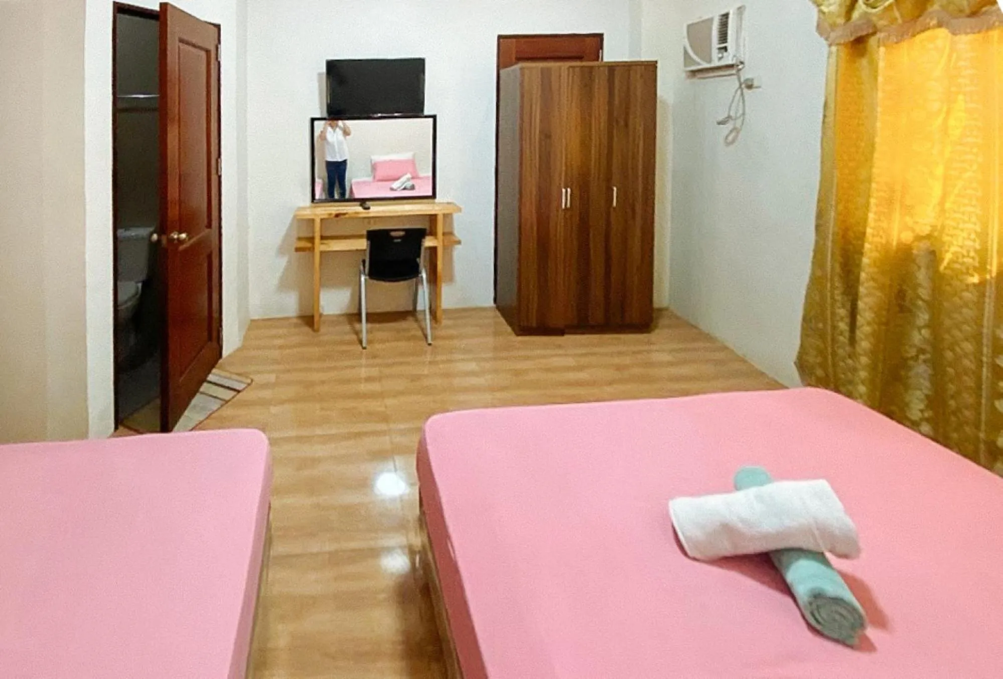 Bed in RedDoorz @ 4ks Pension House Bogo City Cebu