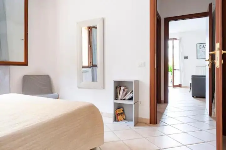 Bedroom, Bed in Casa Nadia - Incantevole appartamento con giardino