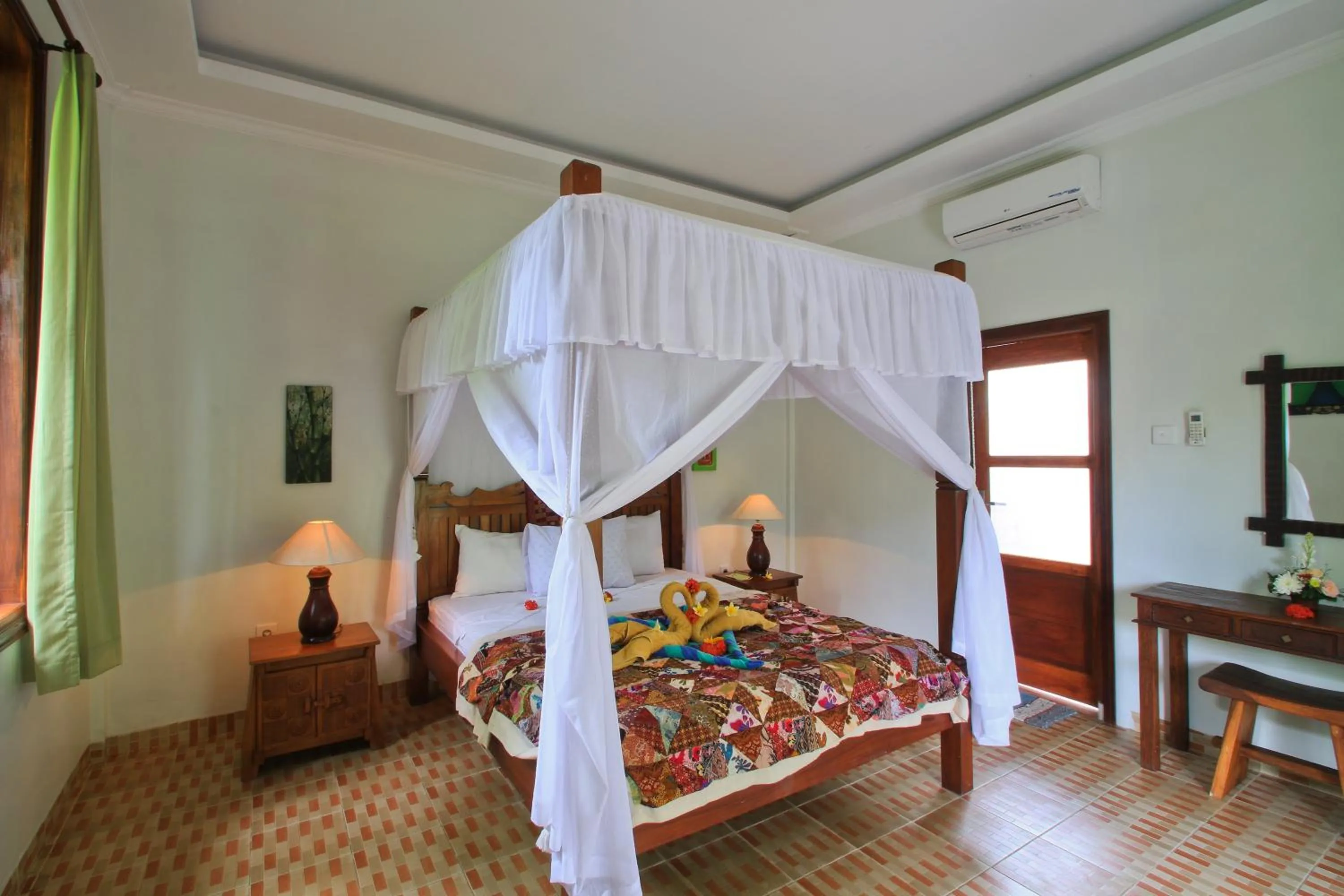 Seating area, Bed in Amed Harmony Bungalows And Villas