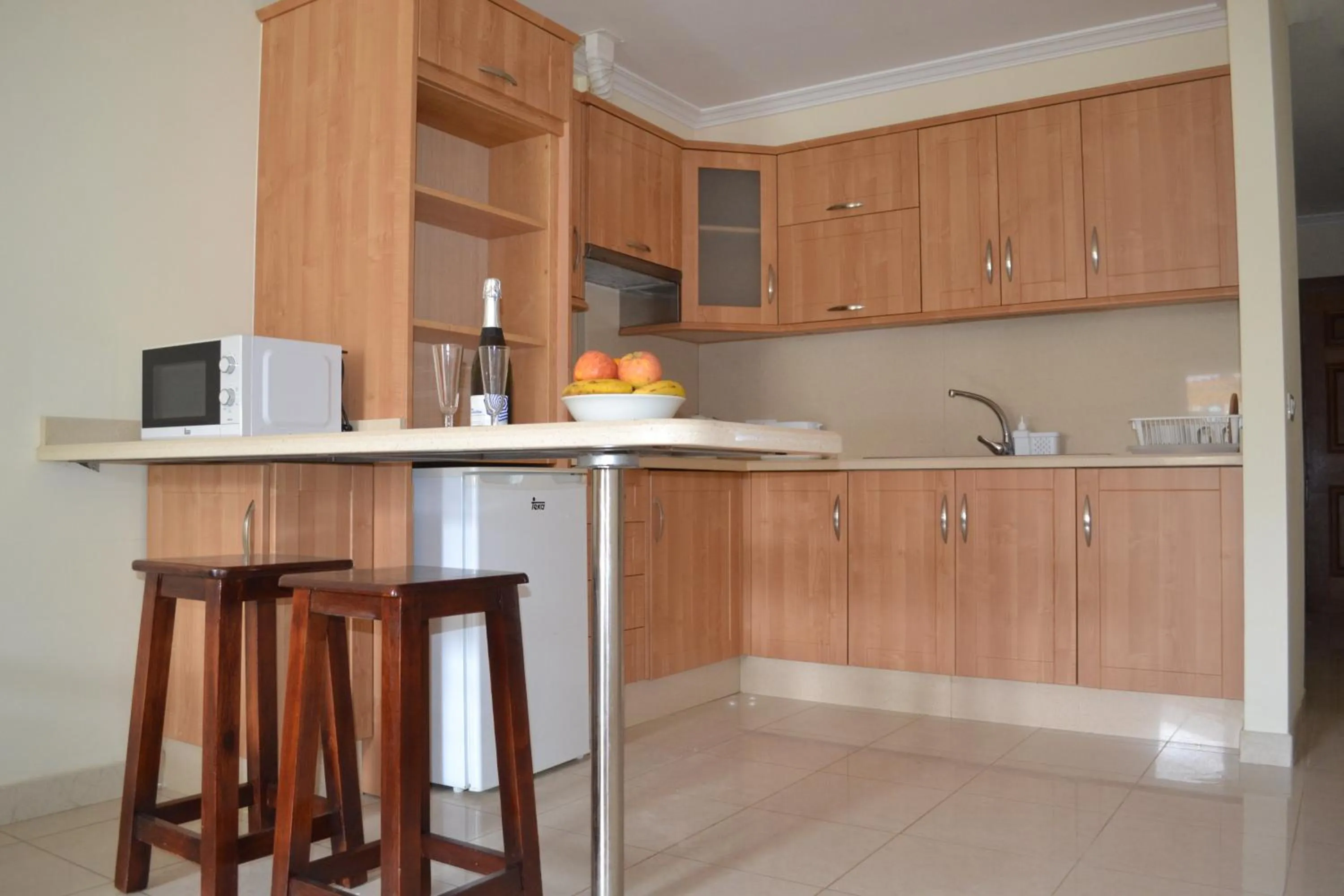 Kitchen or kitchenette in Apartamentos Garden Atlantis en Club Atlantis