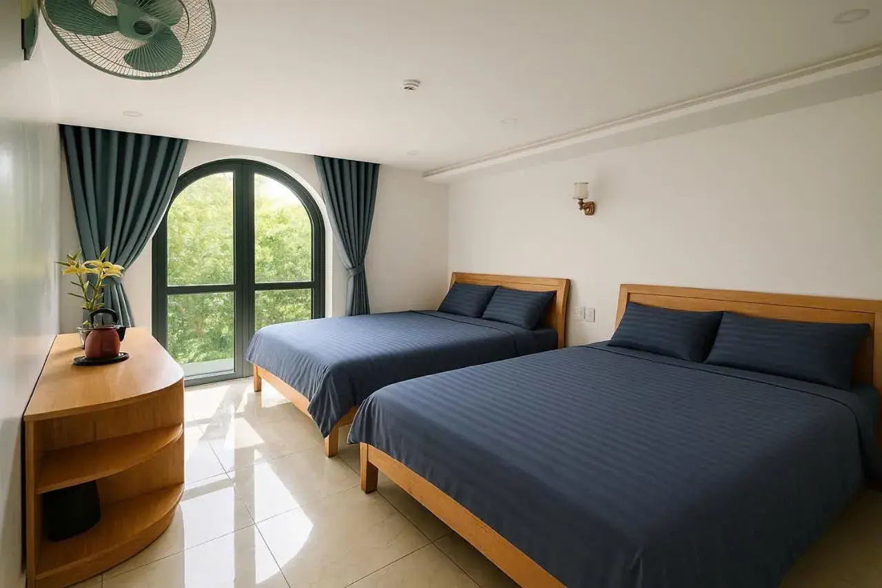 Triple Room with Garden View in Otel Hotel Dalat Triple Room with Garden View in Otel Hotel Dalat