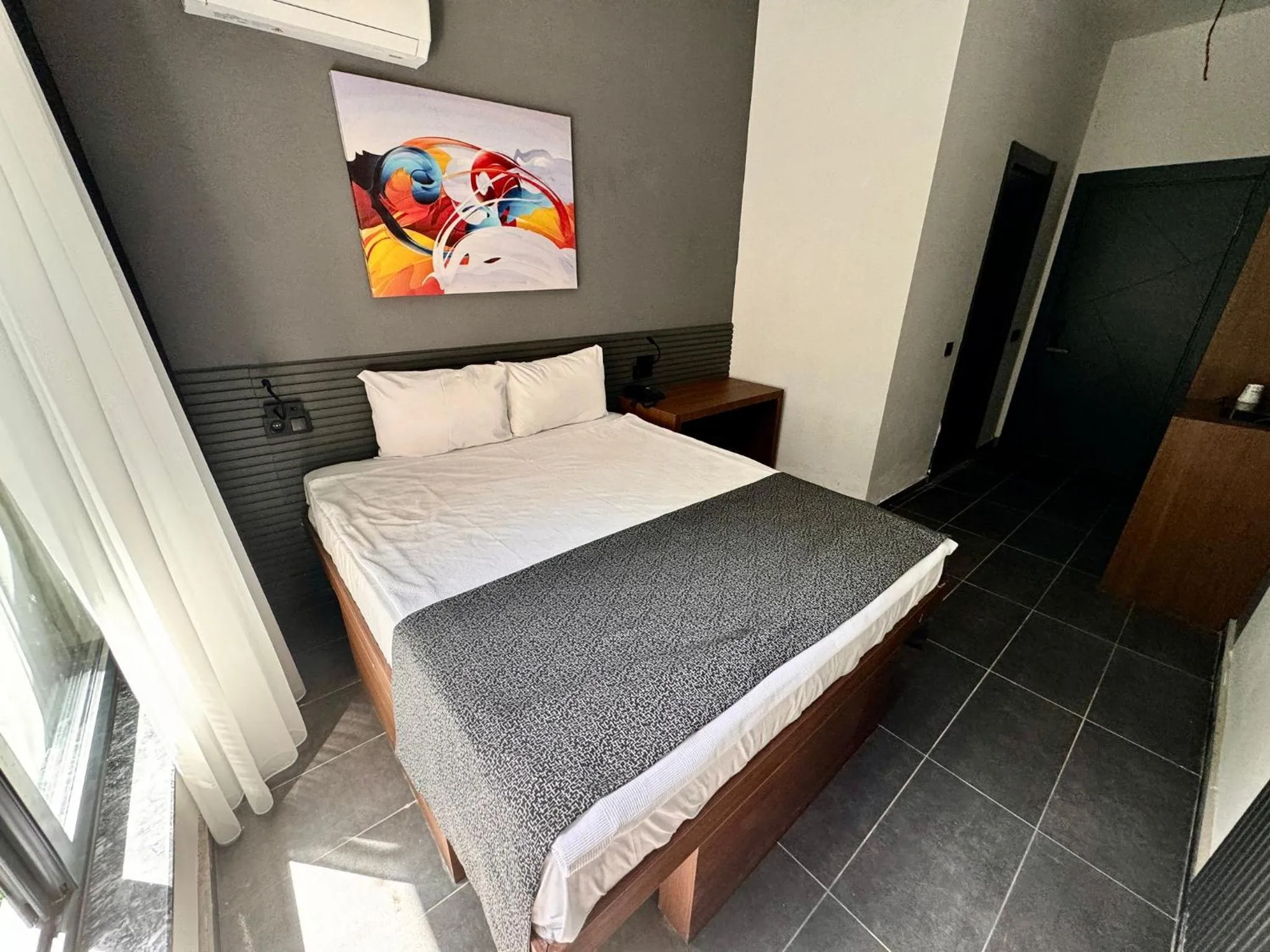 Bed in Wolf Of The City Hotel & Spa