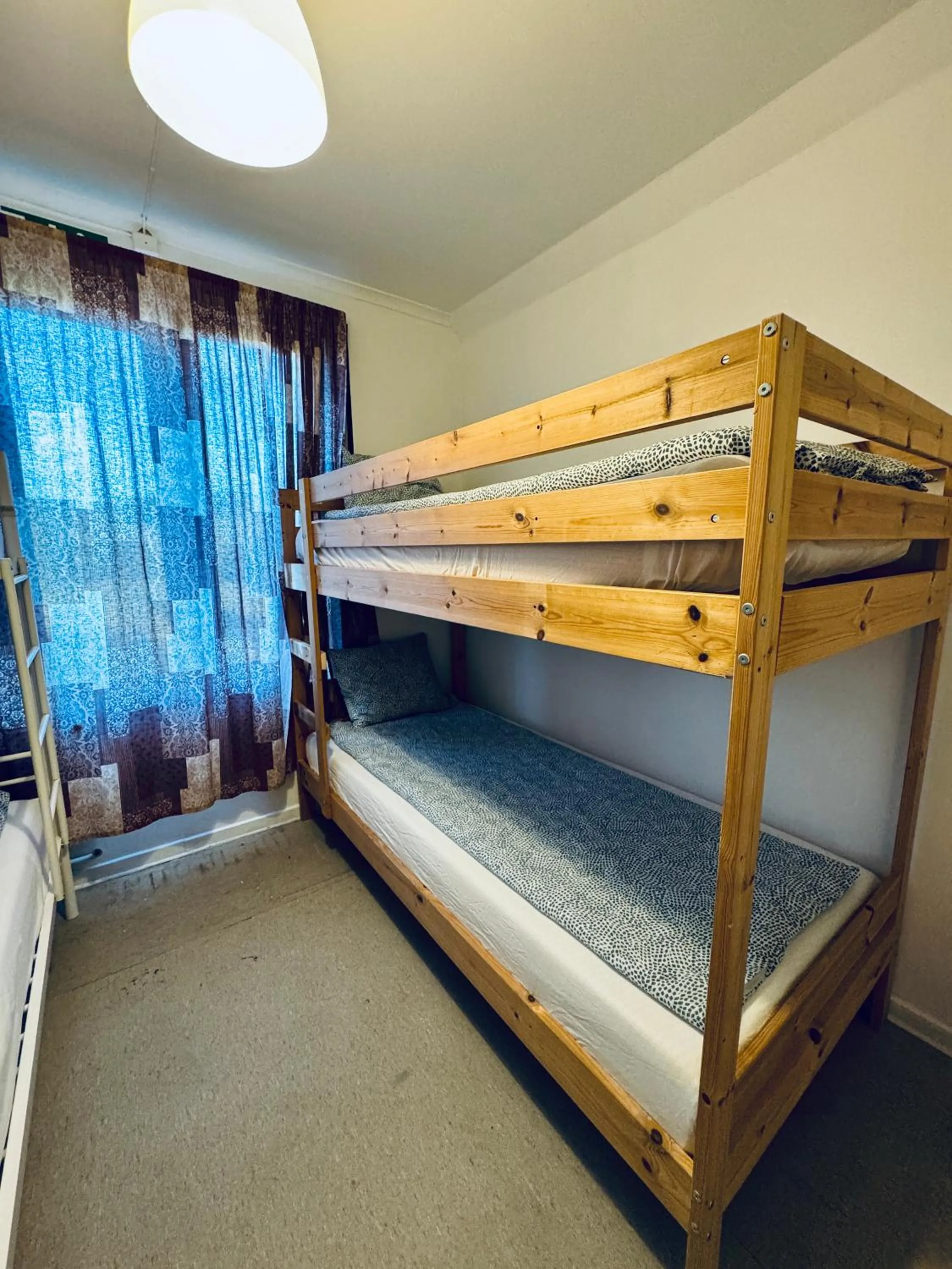 Bed in Hässlebogården Turist & Konferens