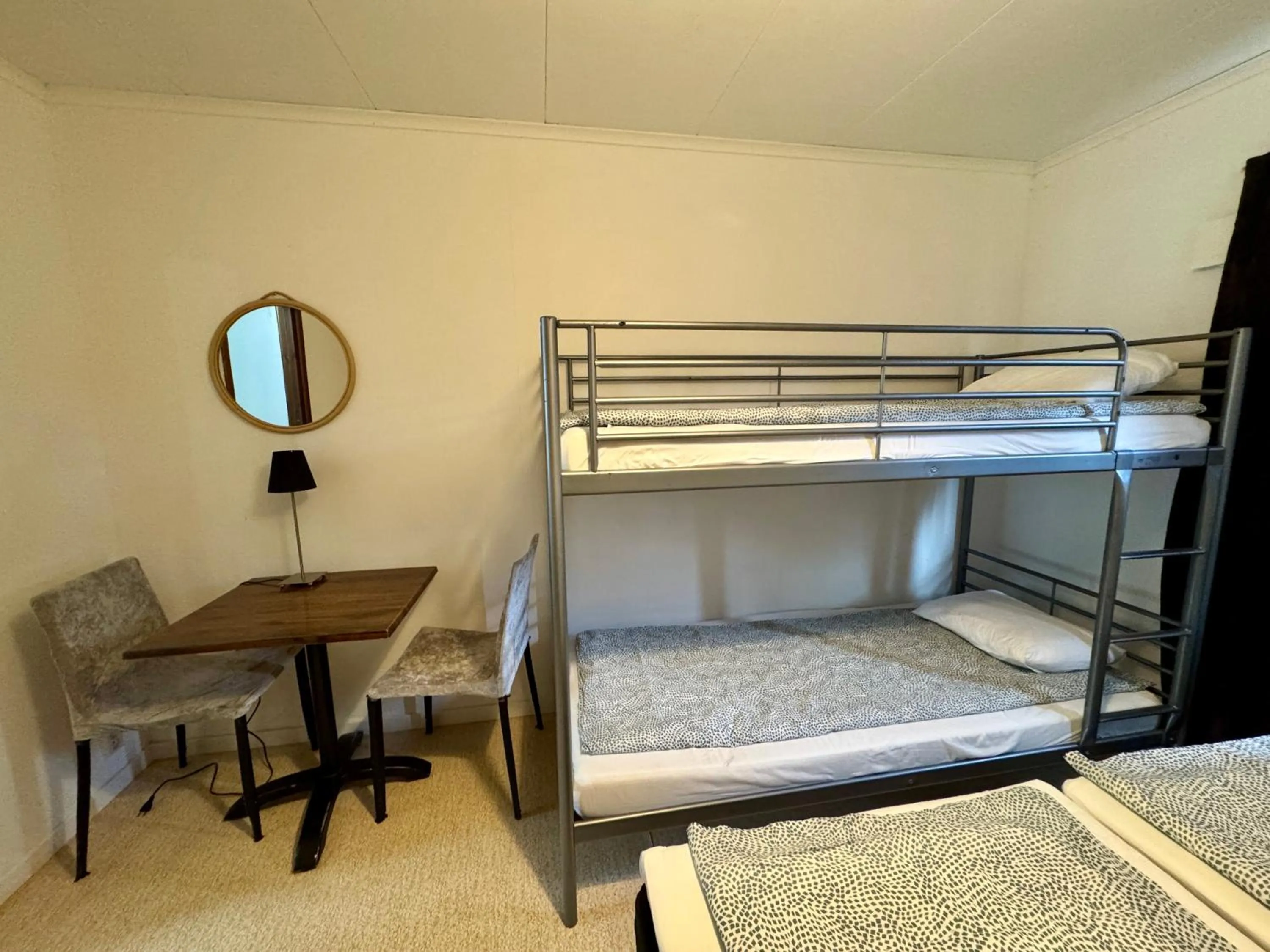 Bed in Hässlebogården Turist & Konferens