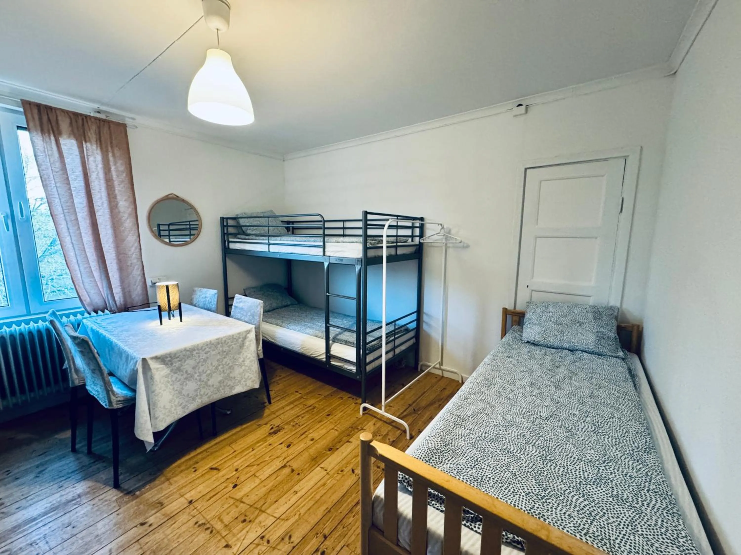 Bed in Hässlebogården Turist & Konferens