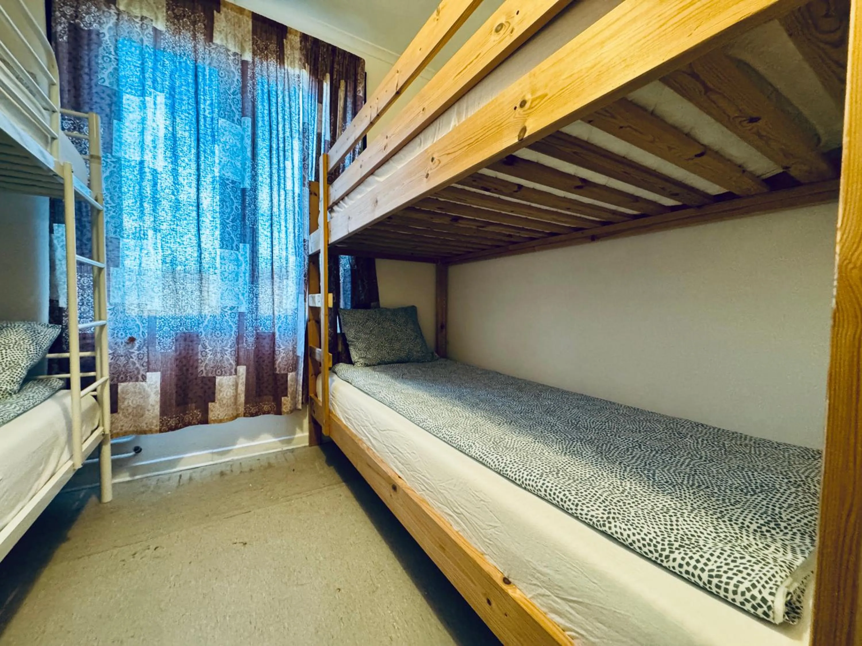 Bed in Hässlebogården Turist & Konferens