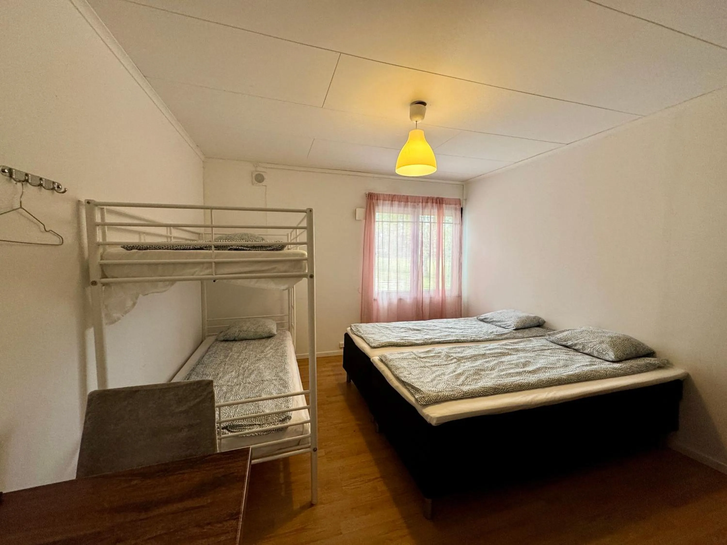 Bed in Hässlebogården Turist & Konferens