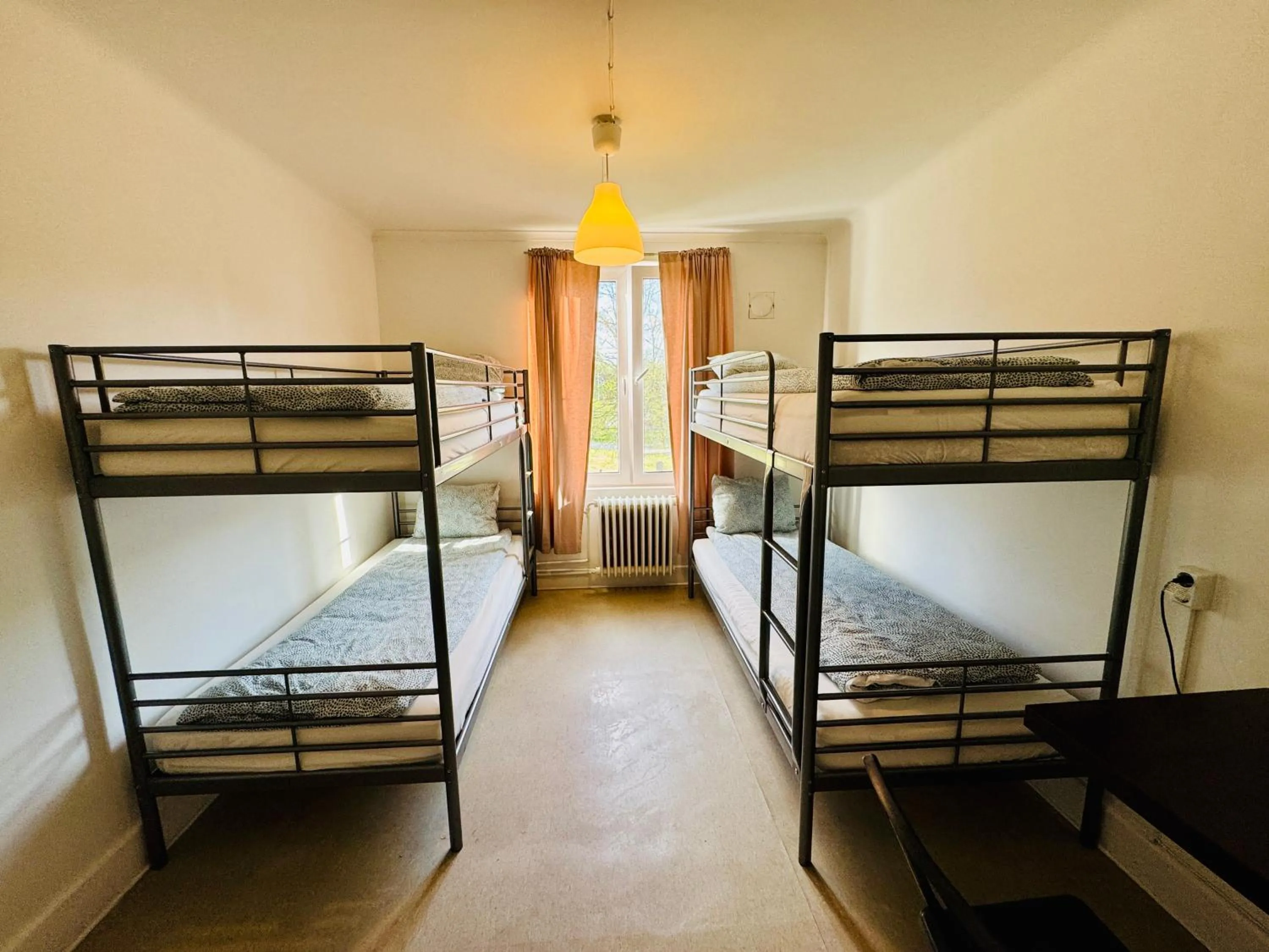 Bed in Hässlebogården Turist & Konferens