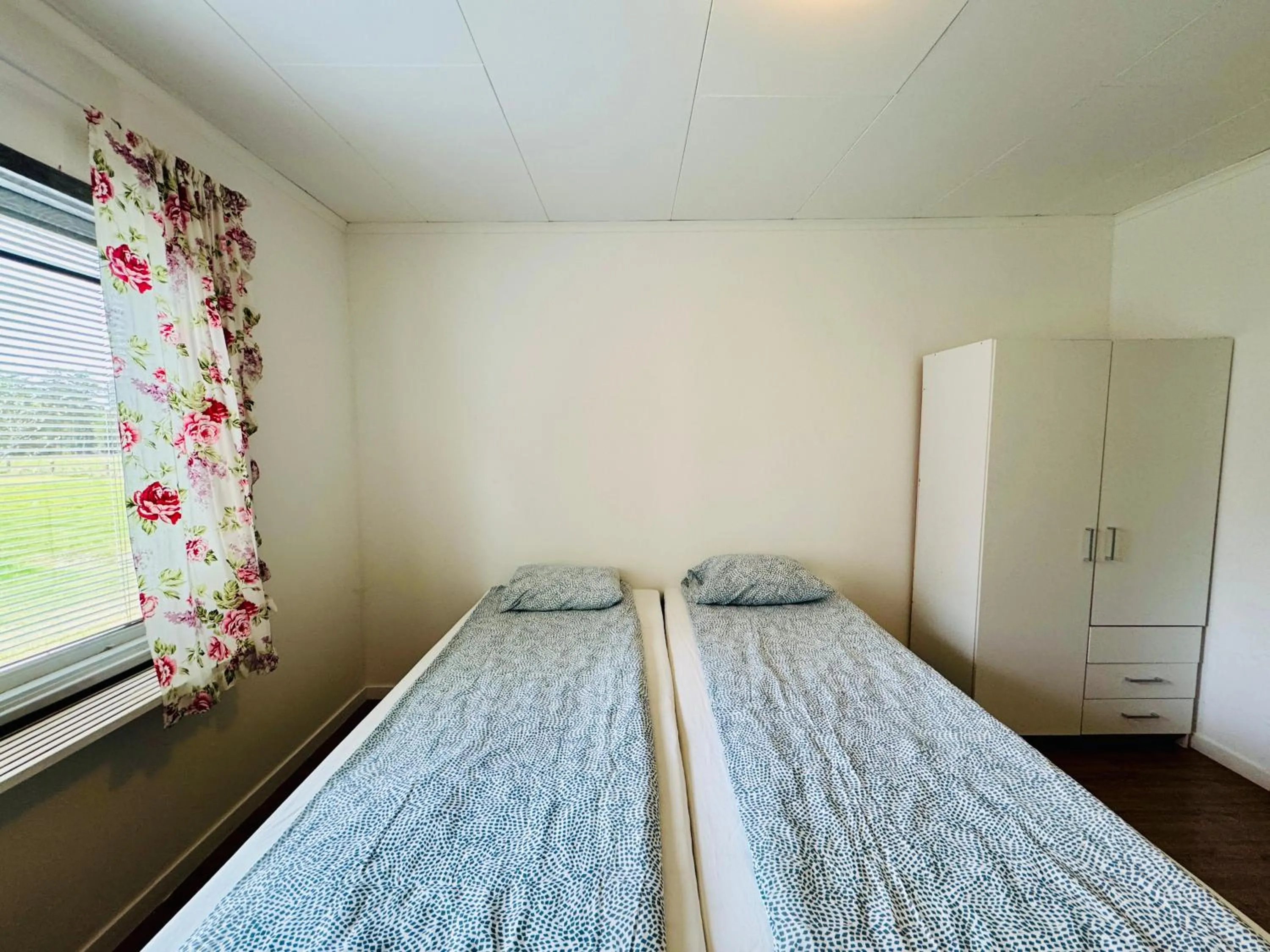 Bed in Hässlebogården Turist & Konferens