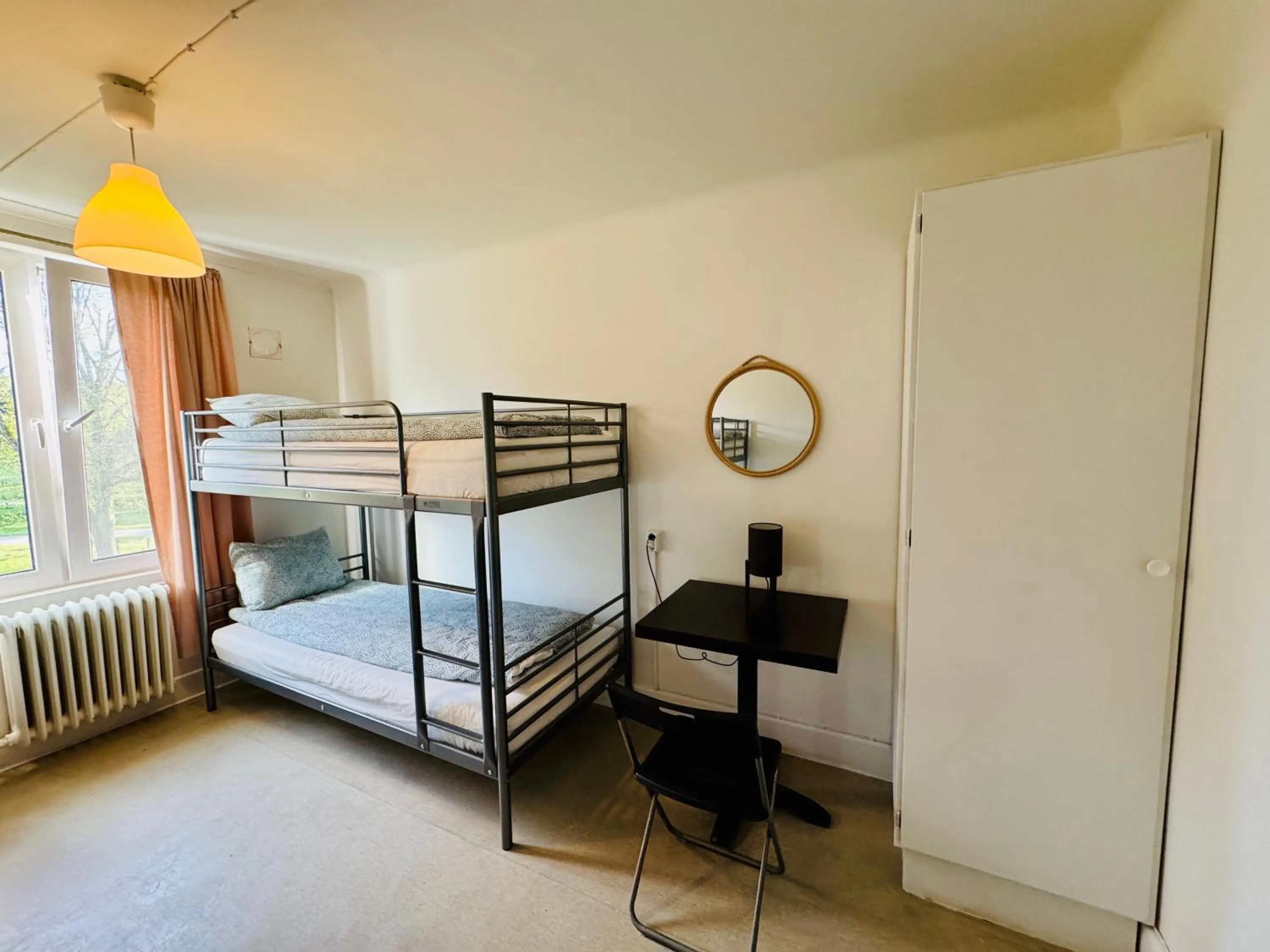 Bed in Hässlebogården Turist & Konferens