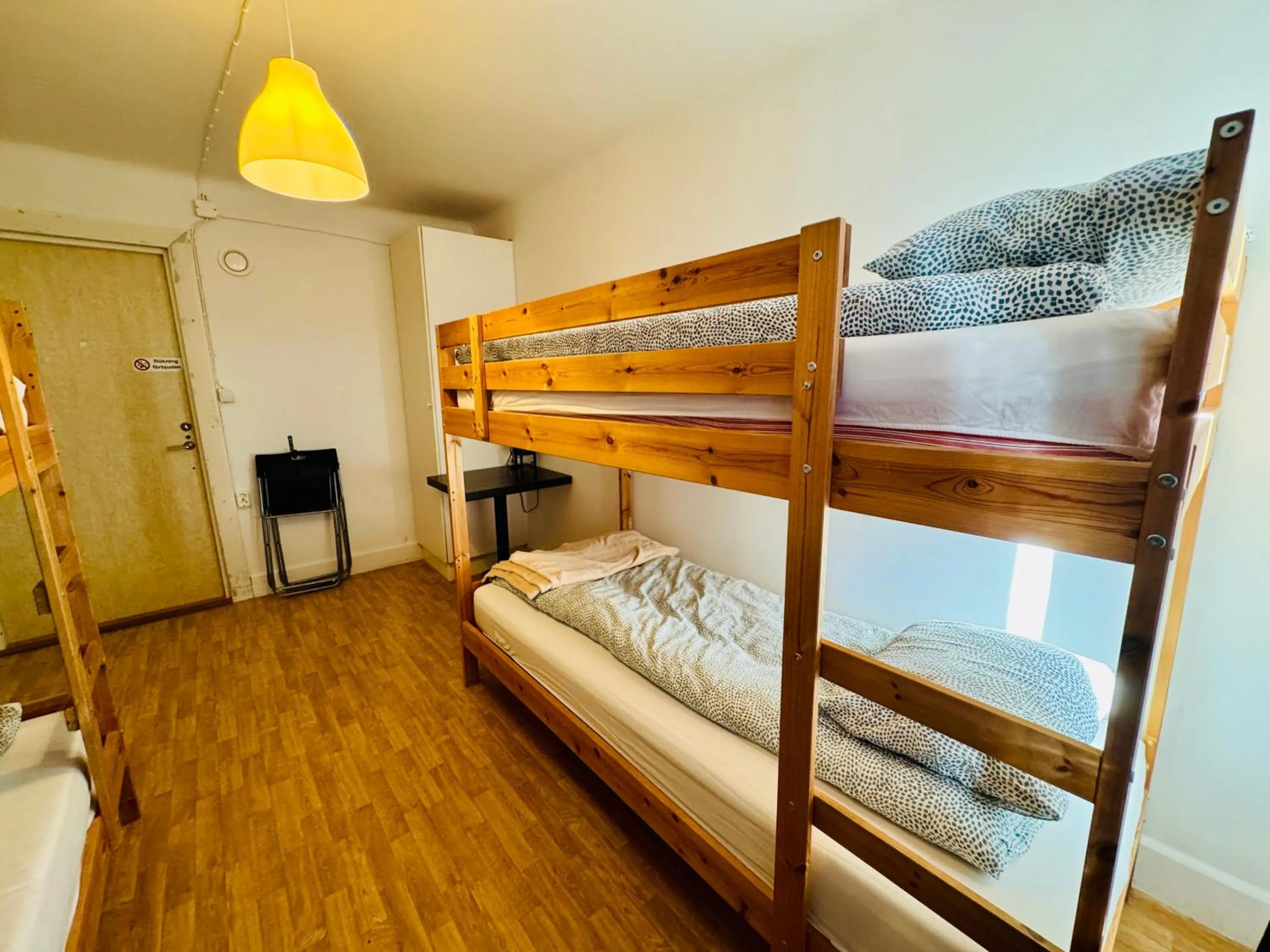 Bed in Hässlebogården Turist & Konferens