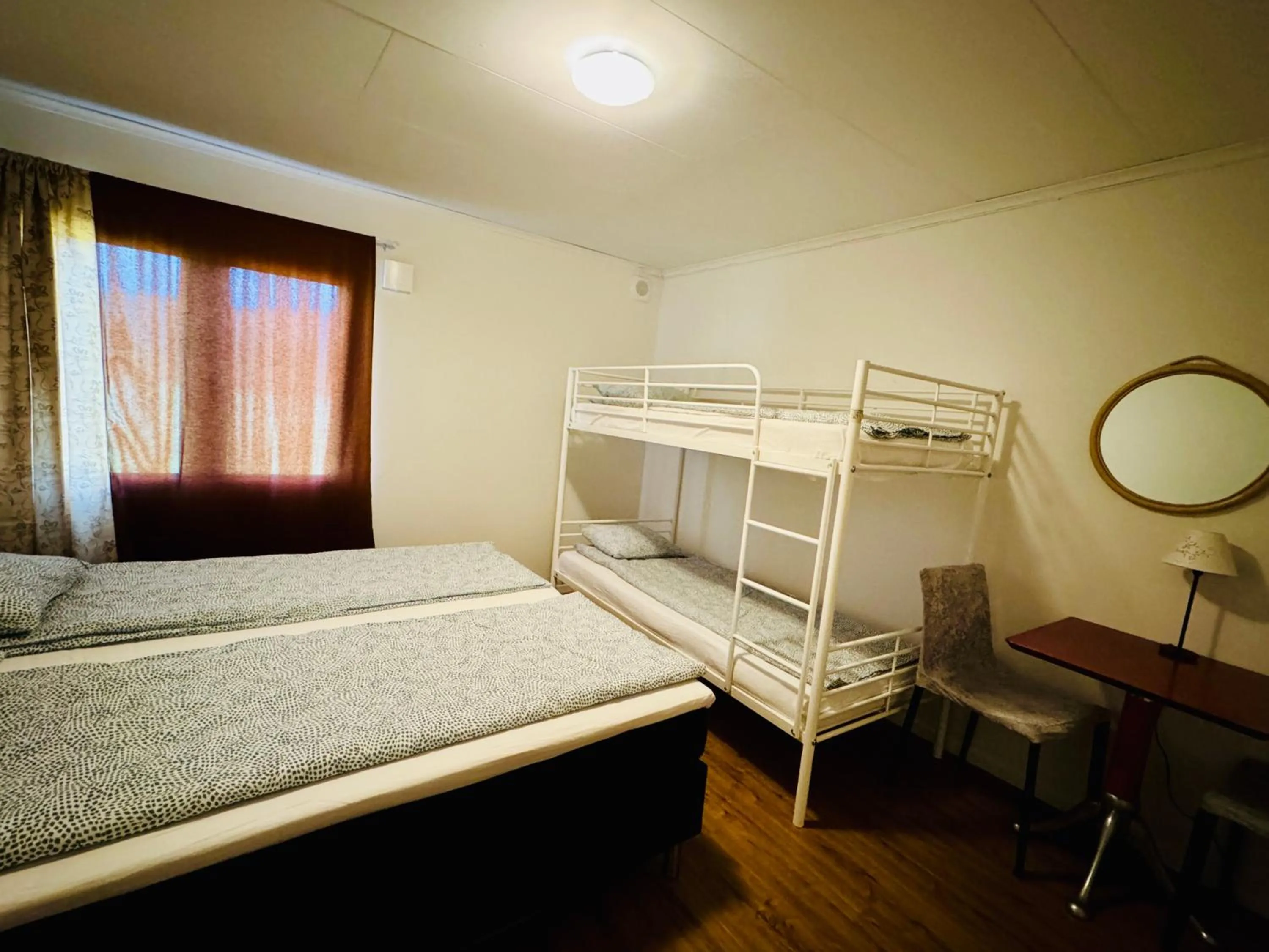 Bed in Hässlebogården Turist & Konferens