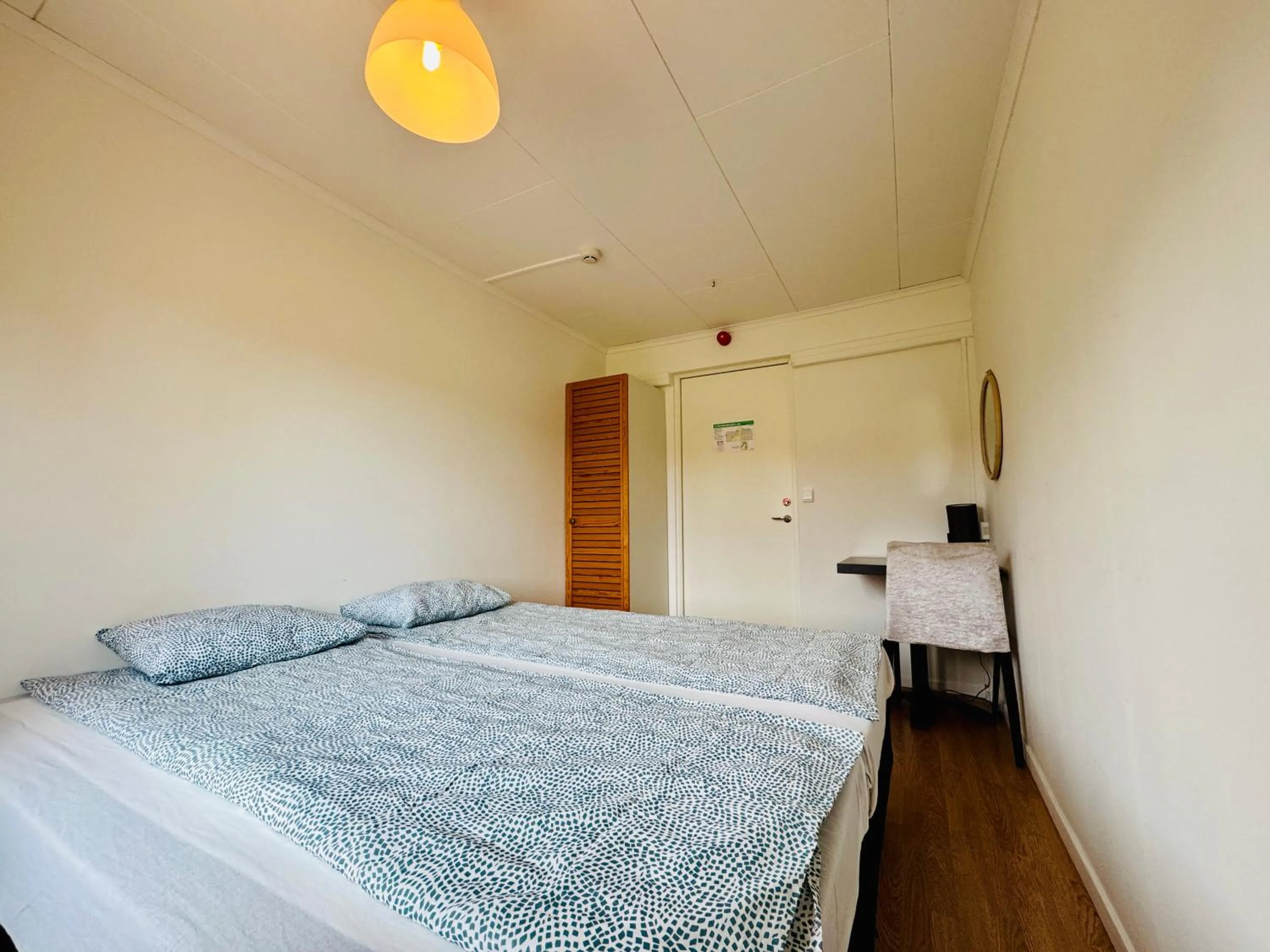 Photo of the whole room, Bed in Hässlebogården Turist & Konferens