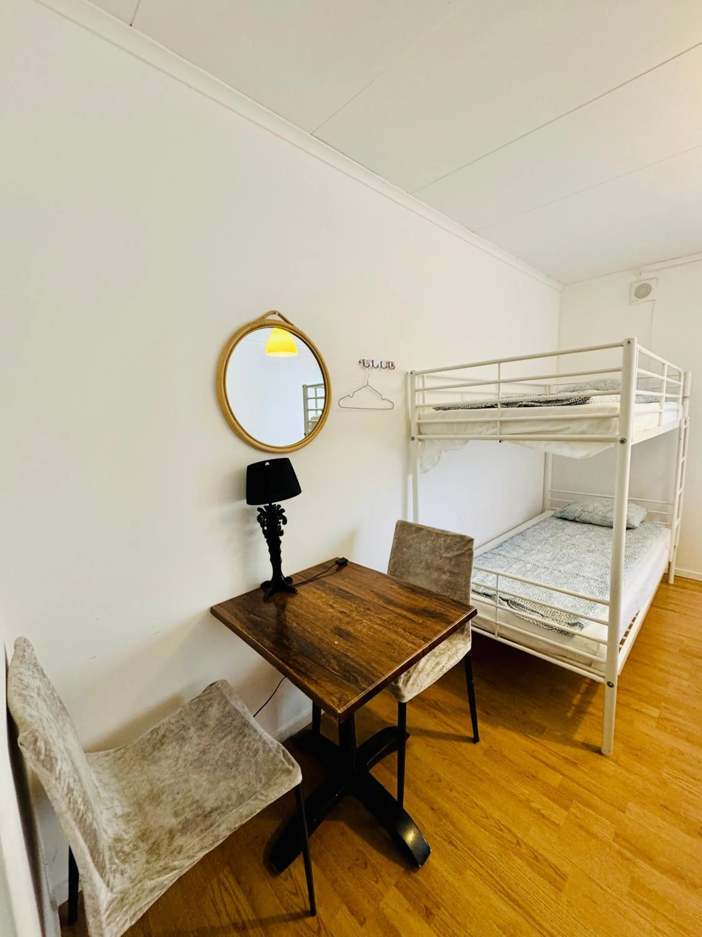 Bed in Hässlebogården Turist & Konferens