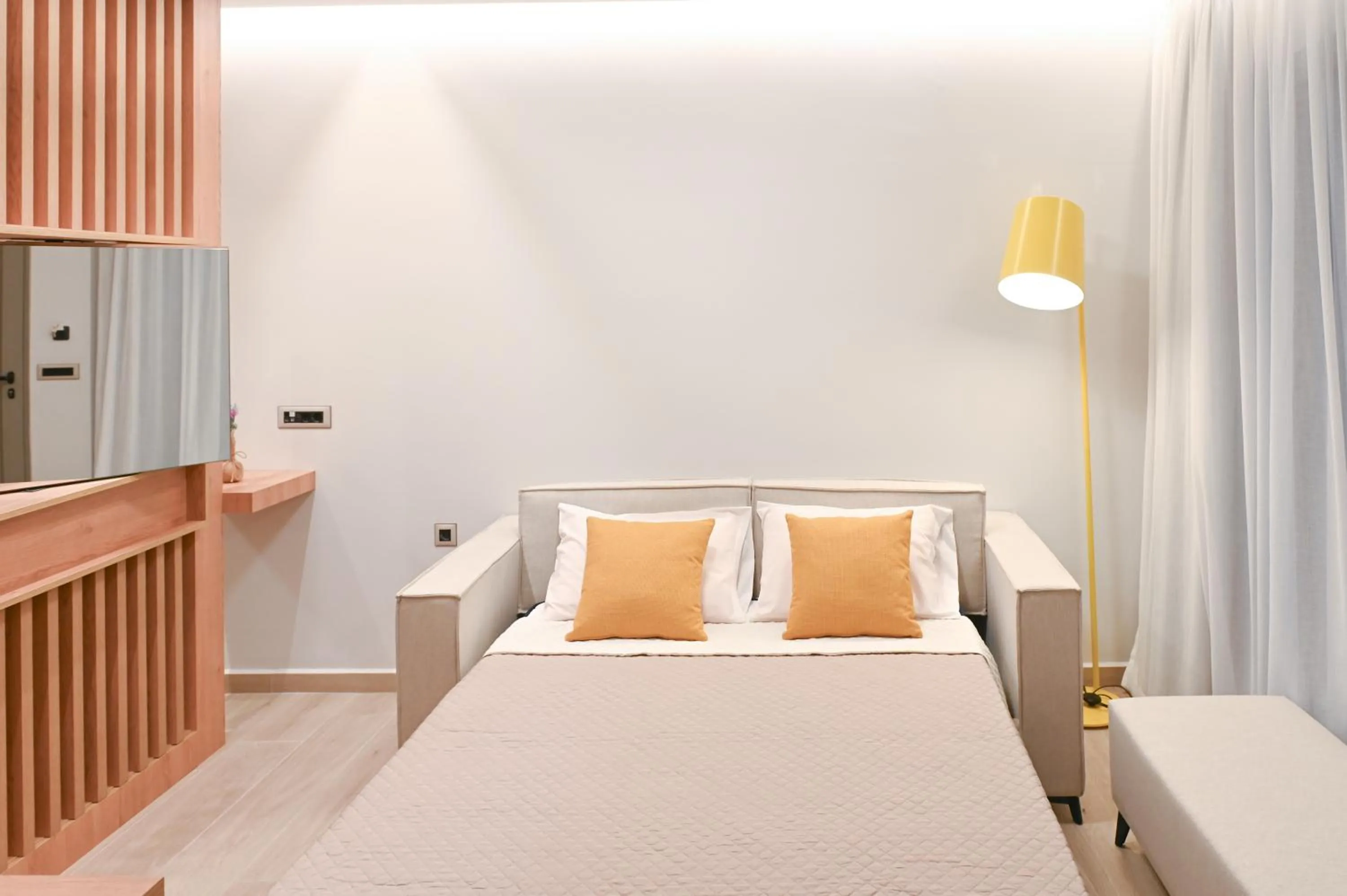 Bed in Almy Beach Hotel