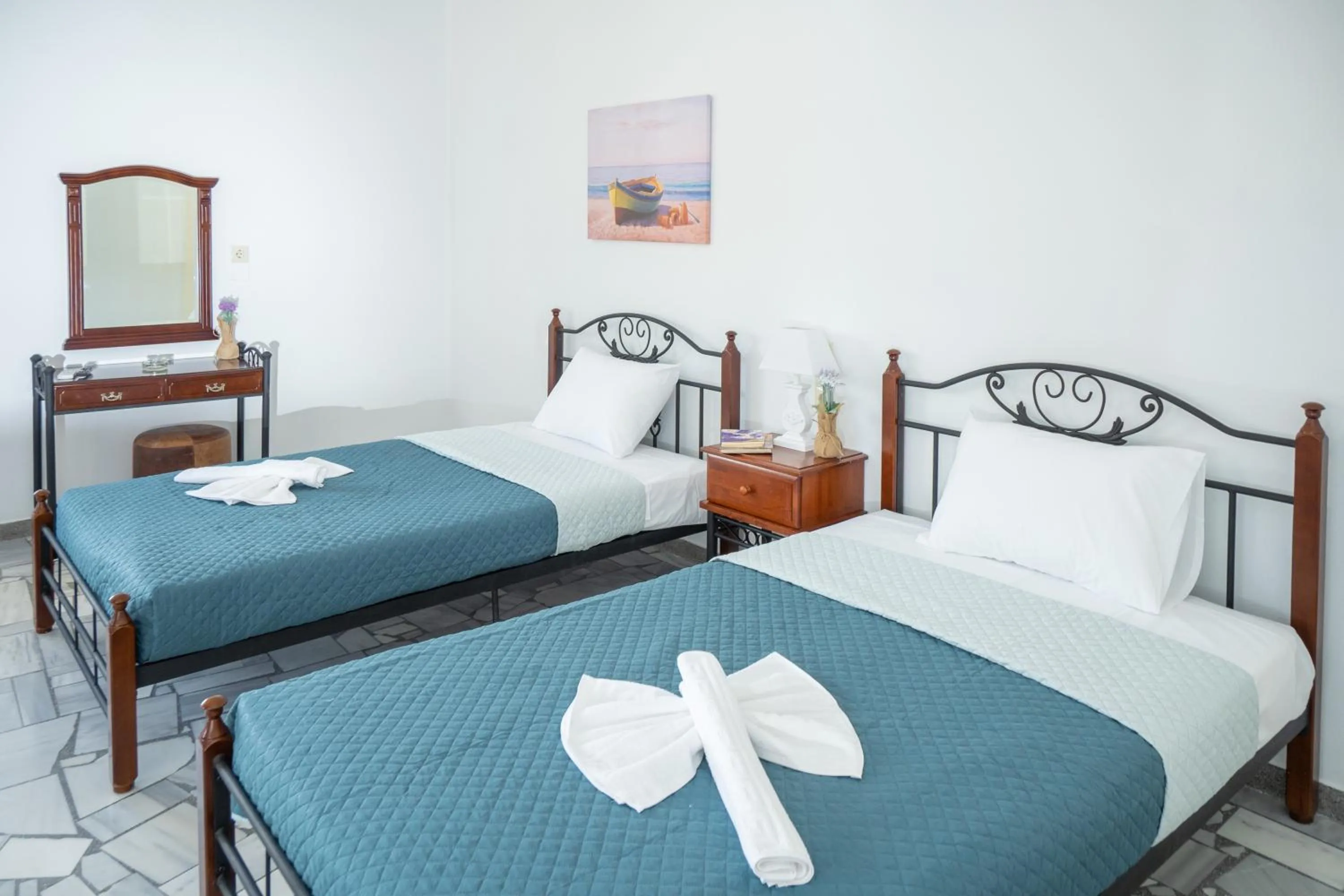 Bed in Almy Beach Hotel