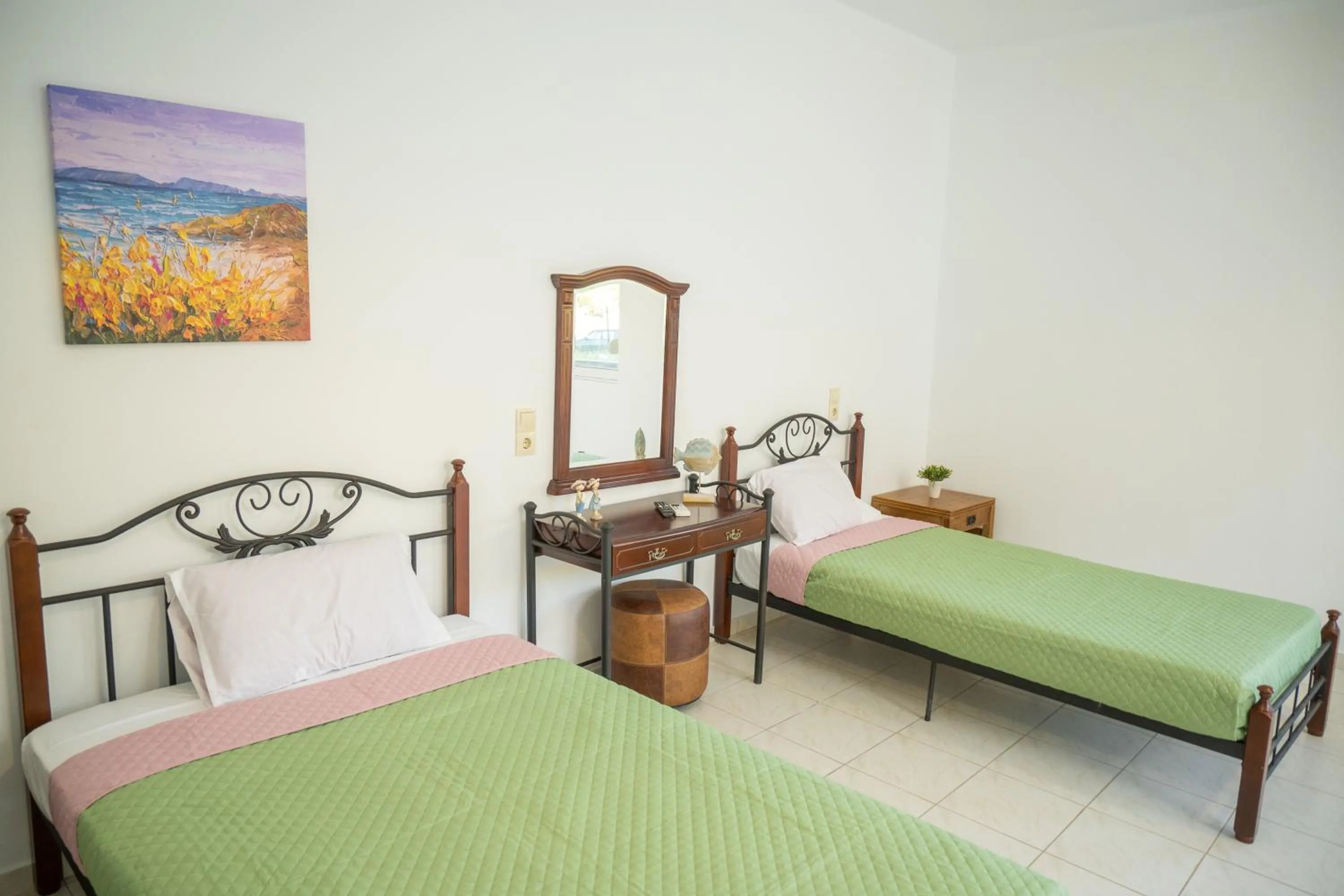 Bed in Almy Beach Hotel