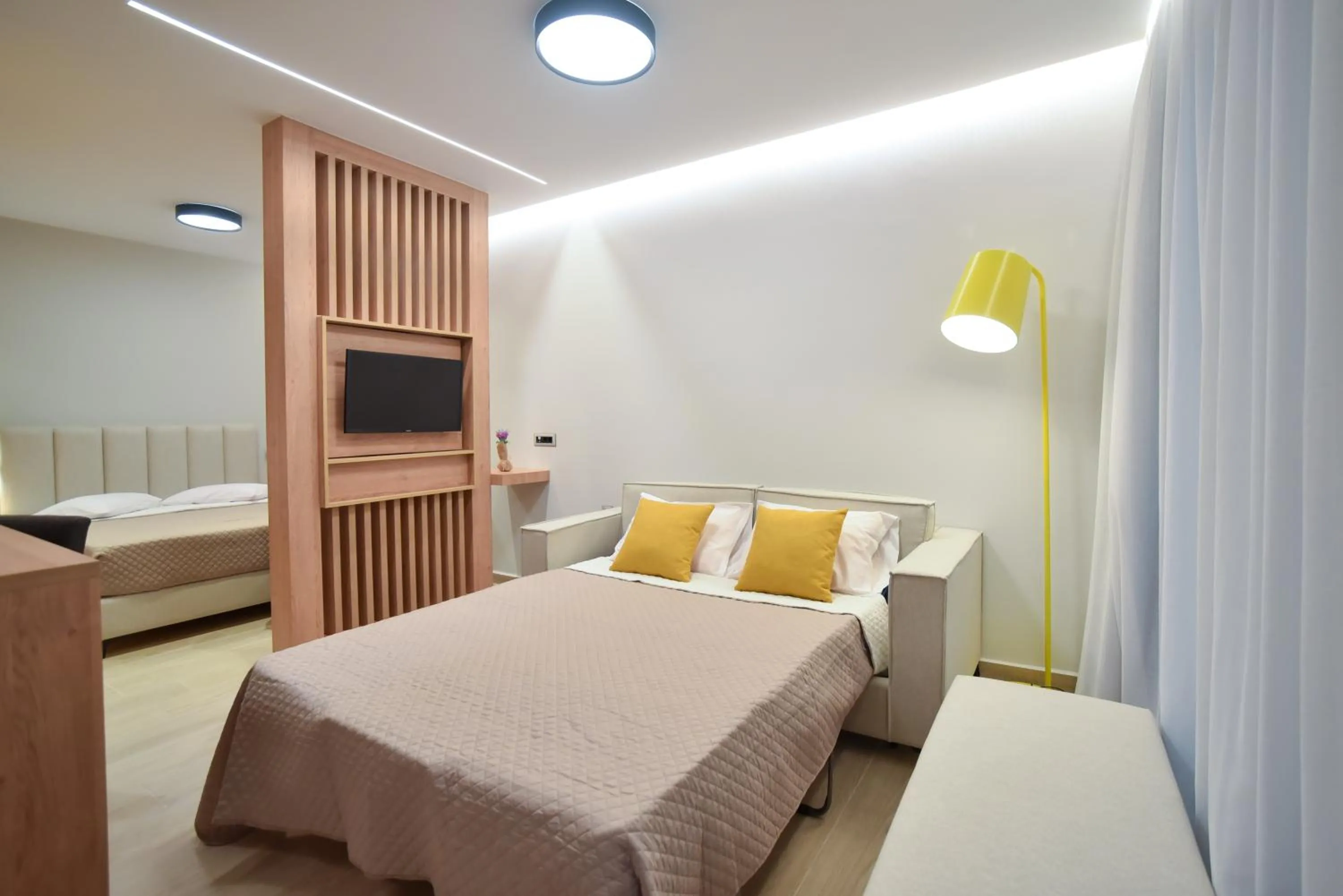 Bed in Almy Beach Hotel