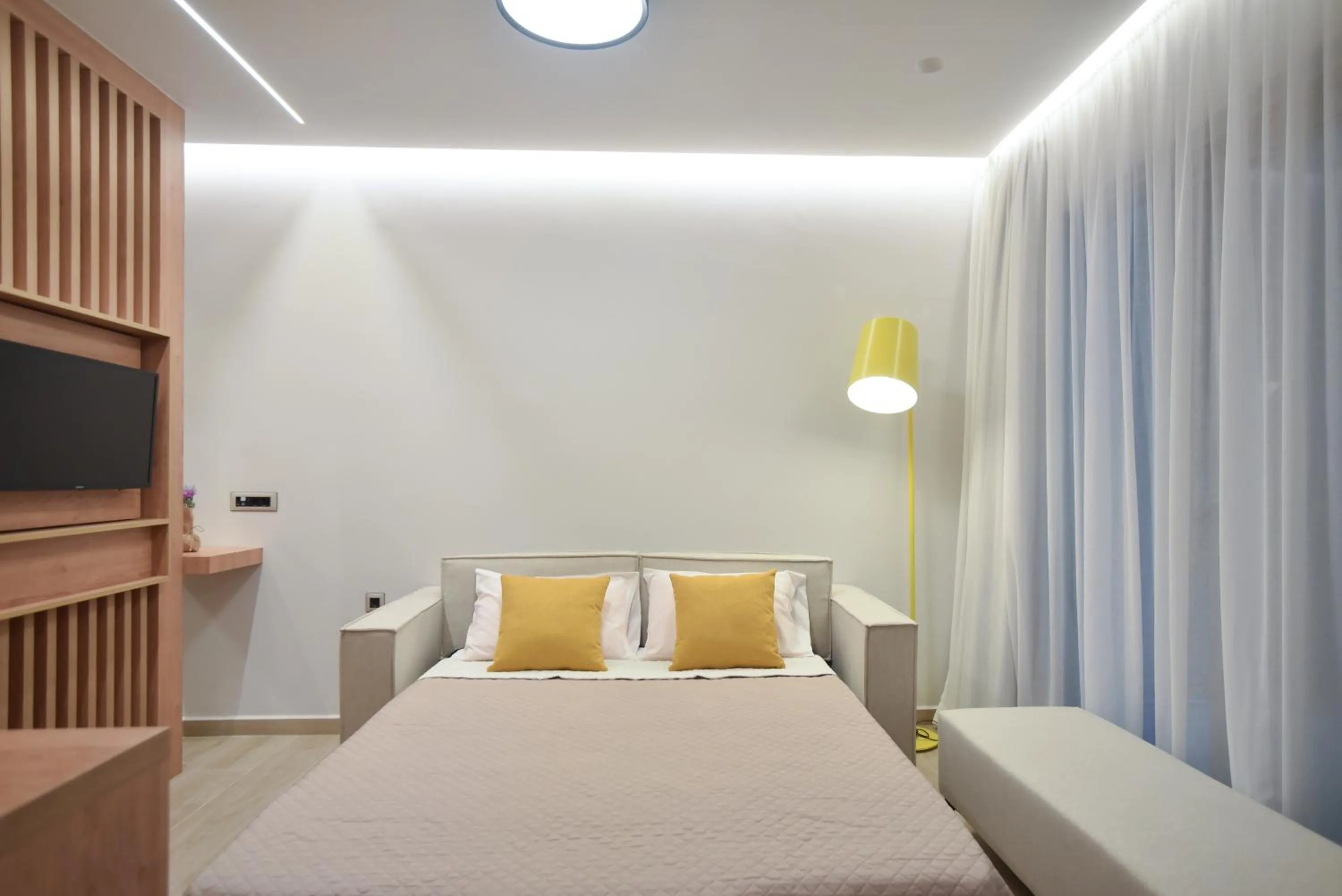 Bed in Almy Beach Hotel