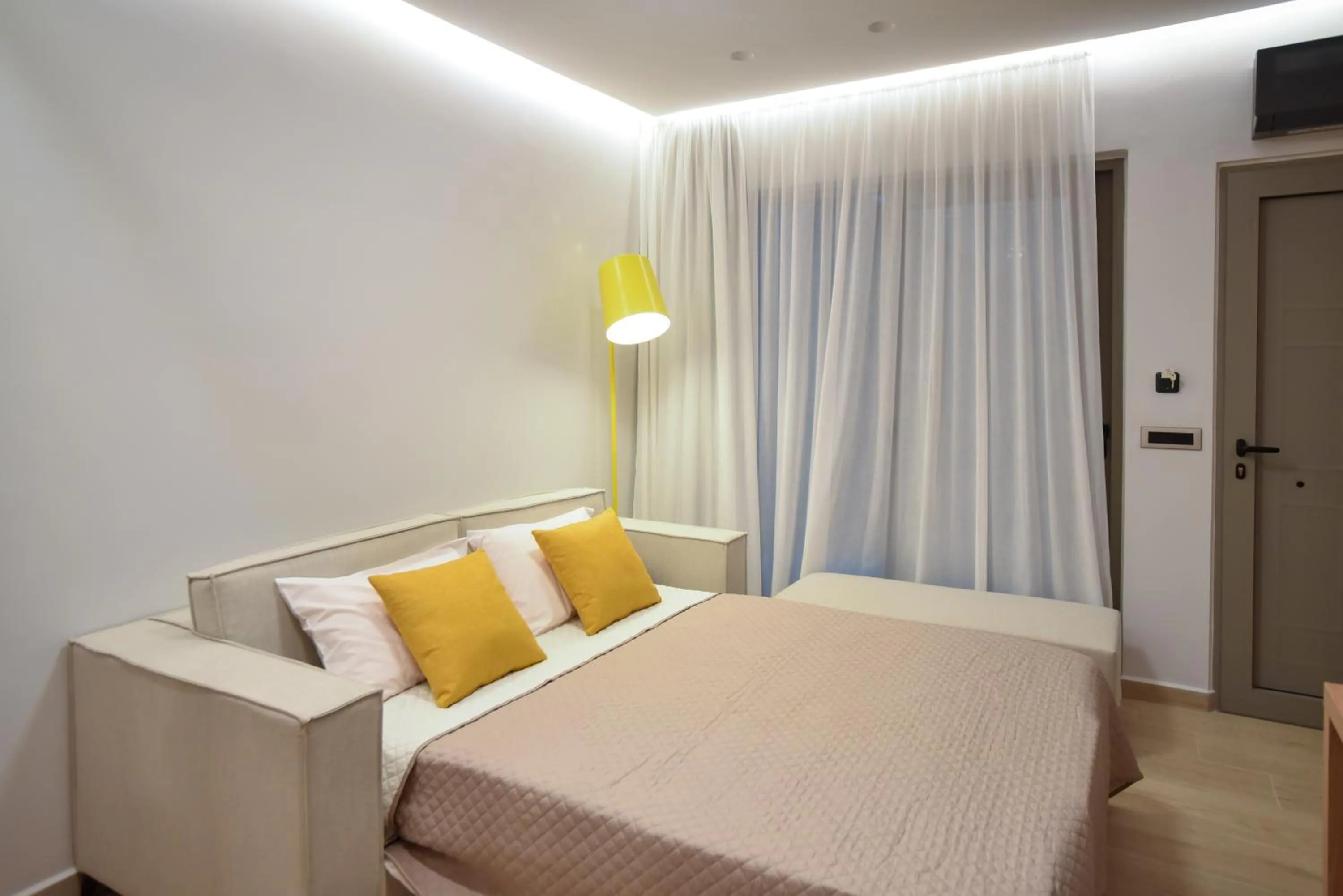 Bed in Almy Beach Hotel