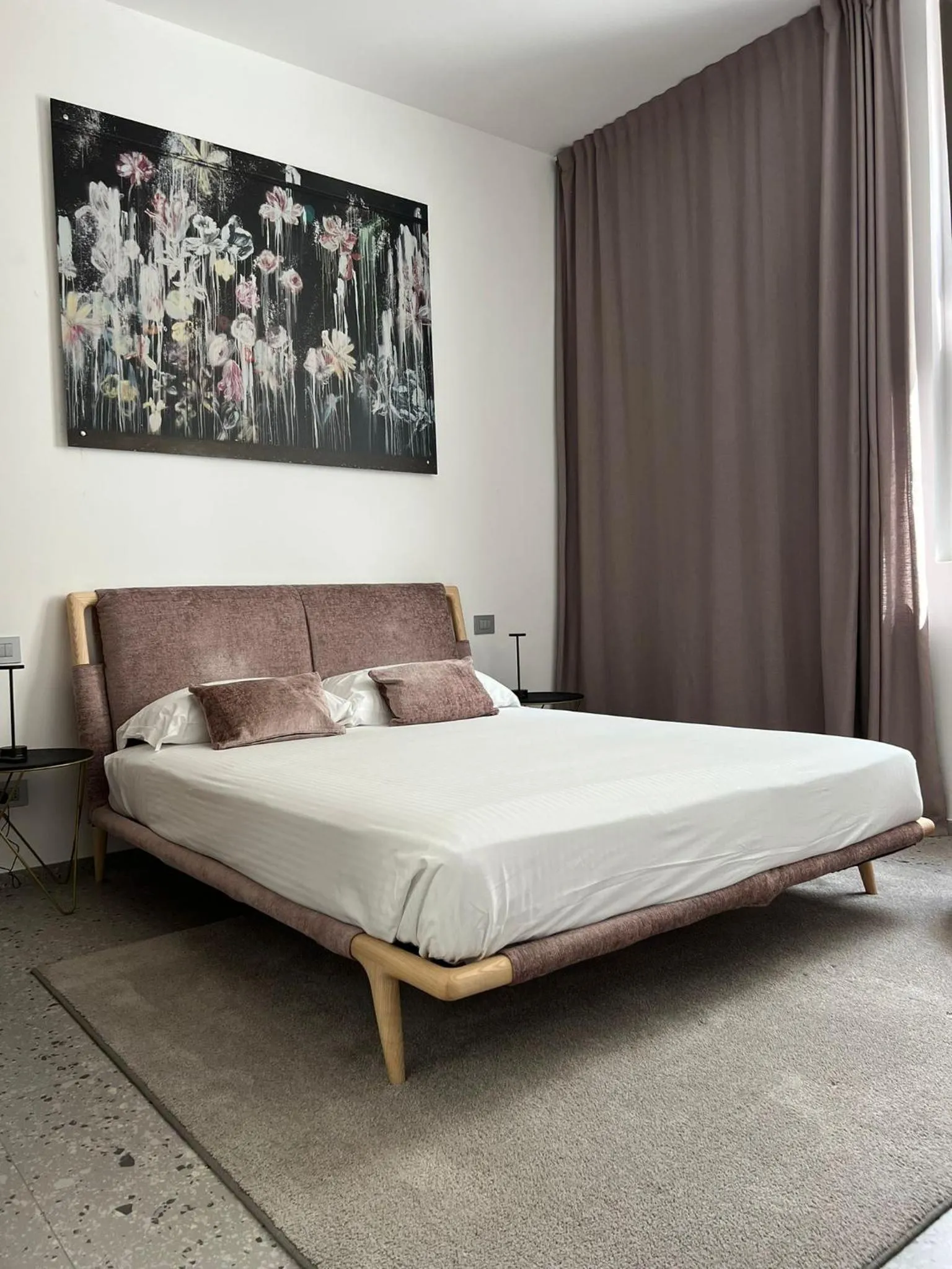 Bed in Lisetta Gardens Boutique & Suites