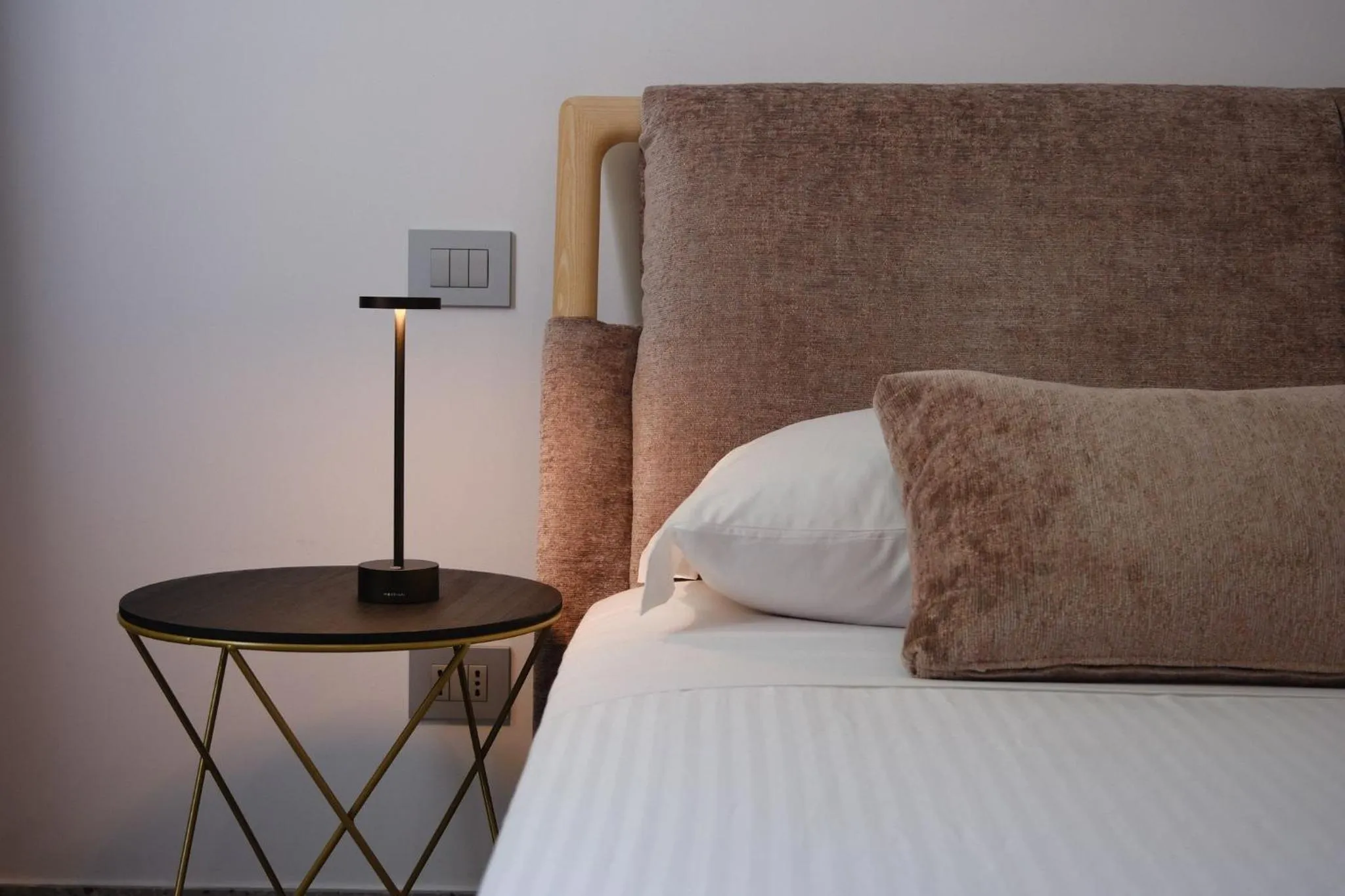 Bed in Lisetta Gardens Boutique & Suites