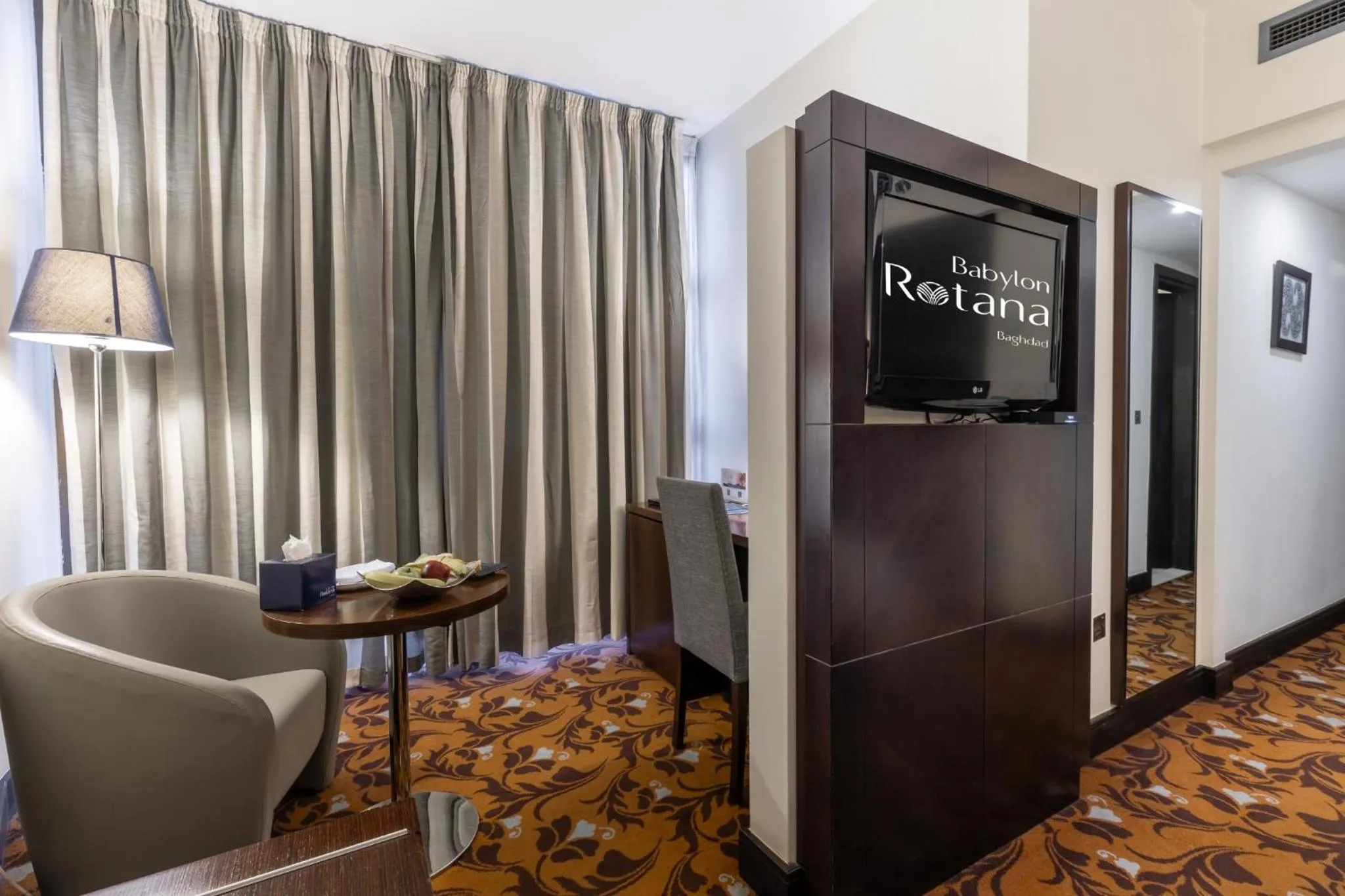 Living room in Babylon Rotana Hotel