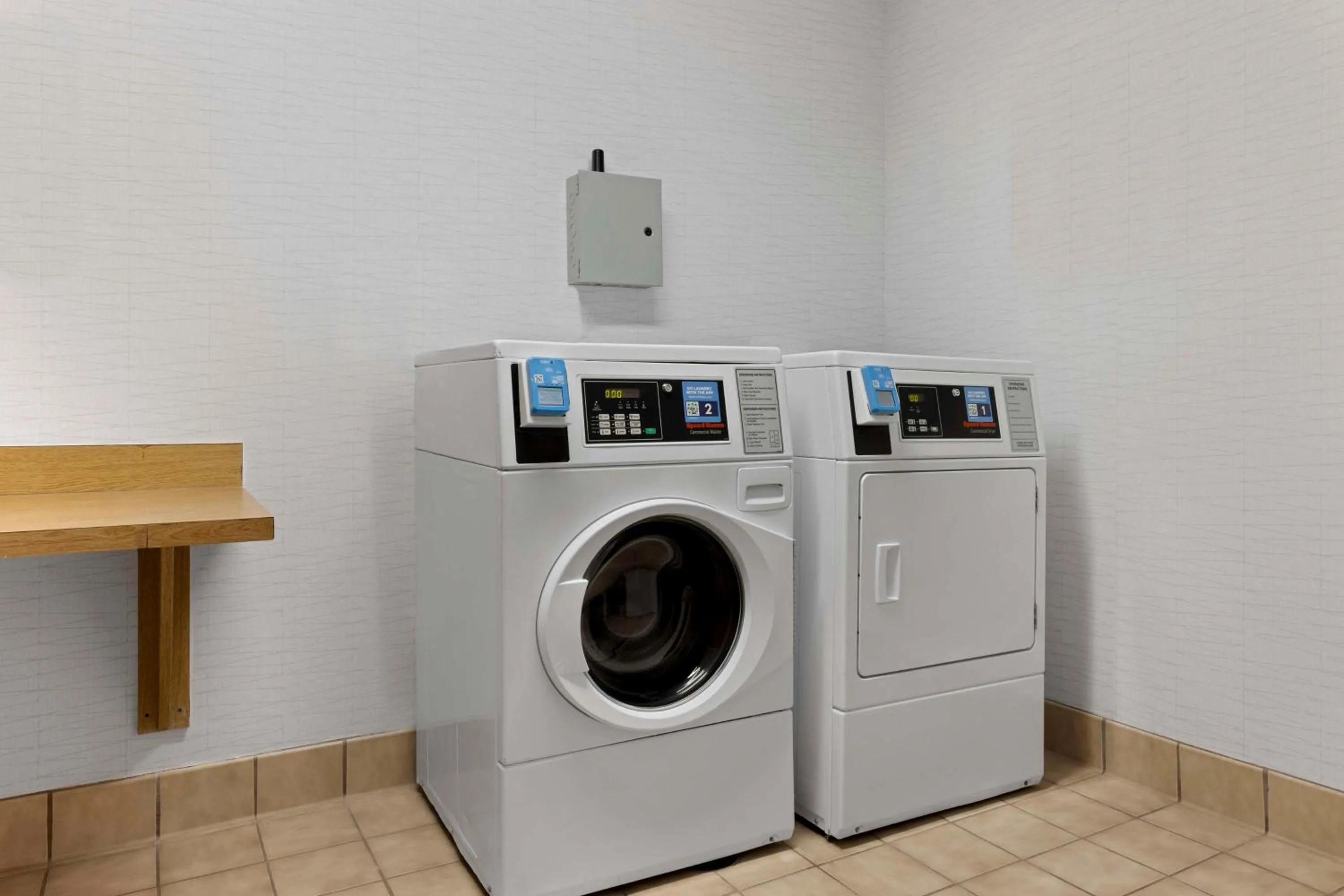 laundry in Spark By Hilton Newcomerstown