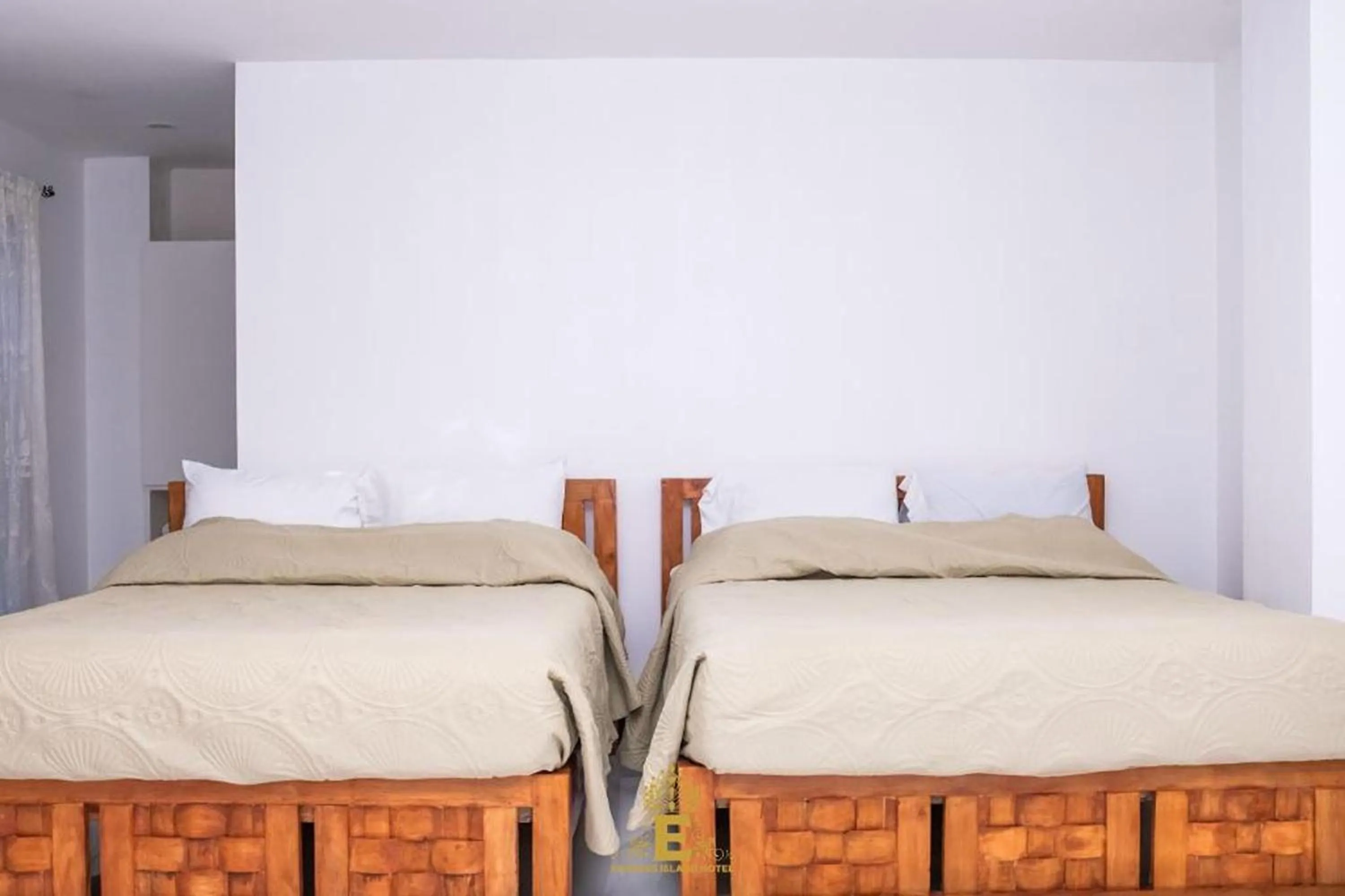 Bed in Empress Island Hotel