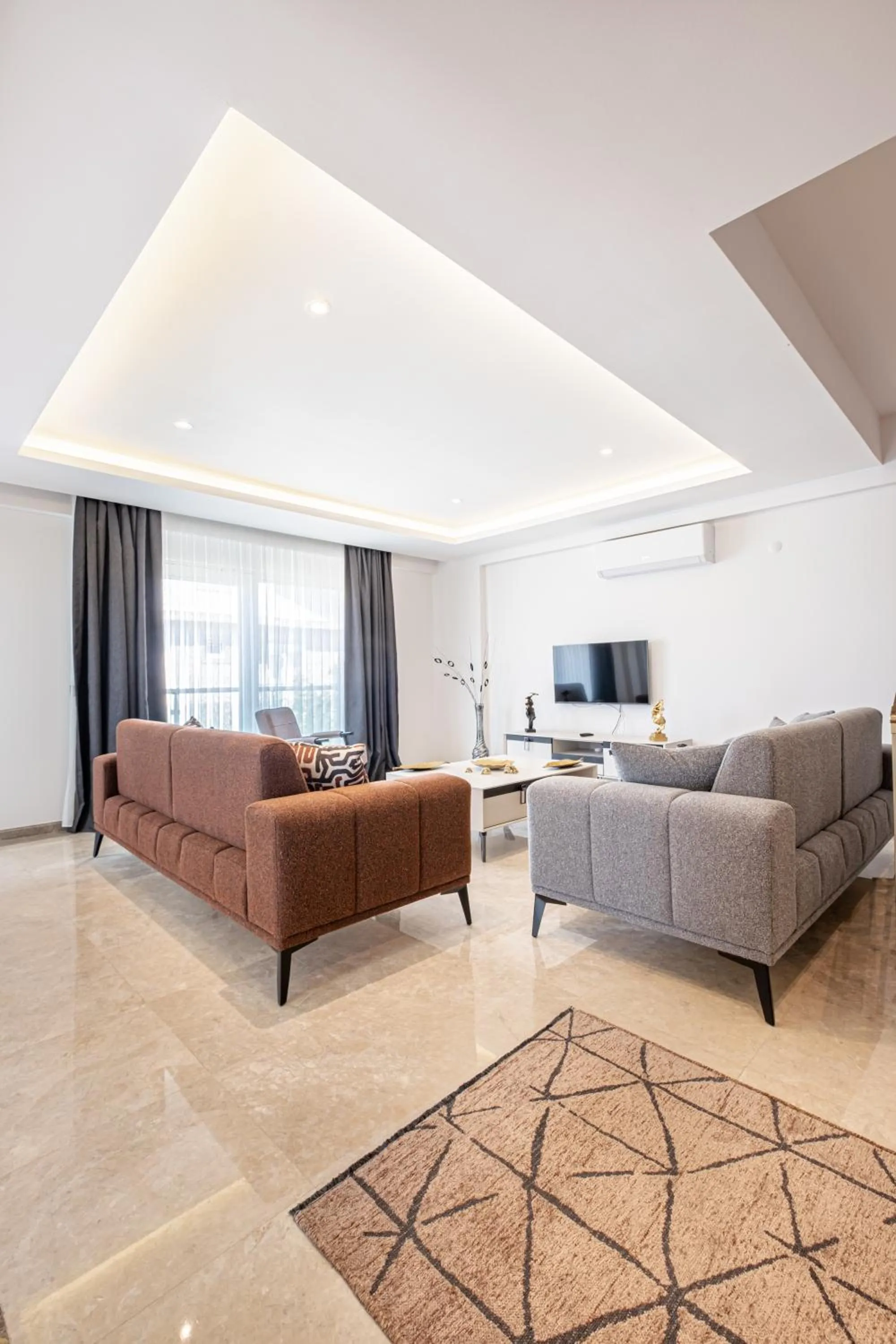 Communal lounge/ TV room in Belek Deluxe Suit