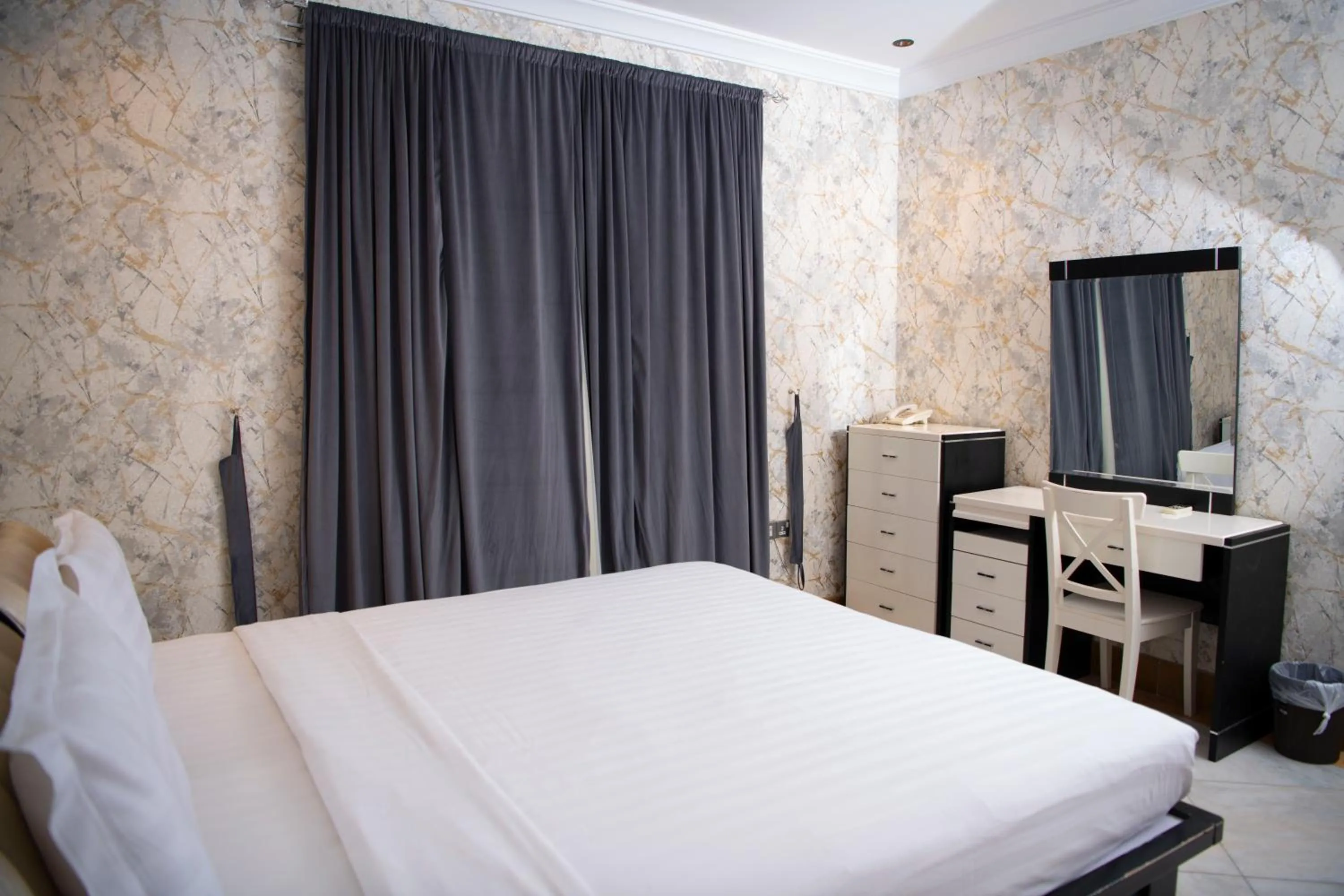 Bed in Al Nabarees Al Masi Hotel