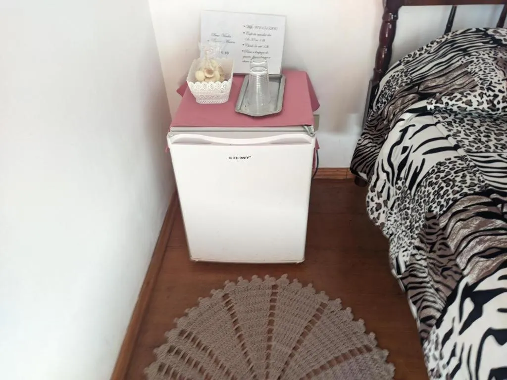 Bed in Pousada dos Marins