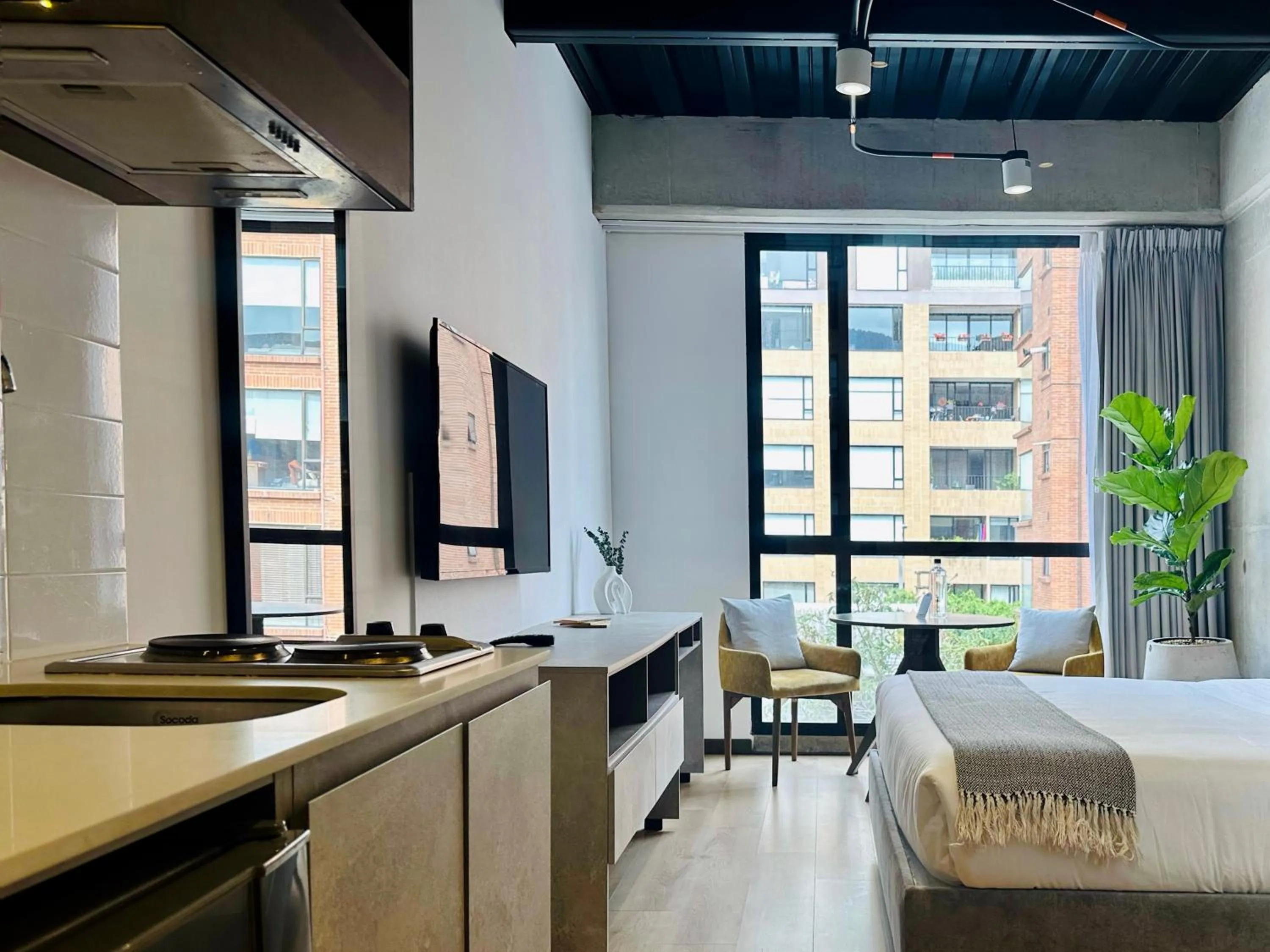 Bed in Beliving by Wynwood House