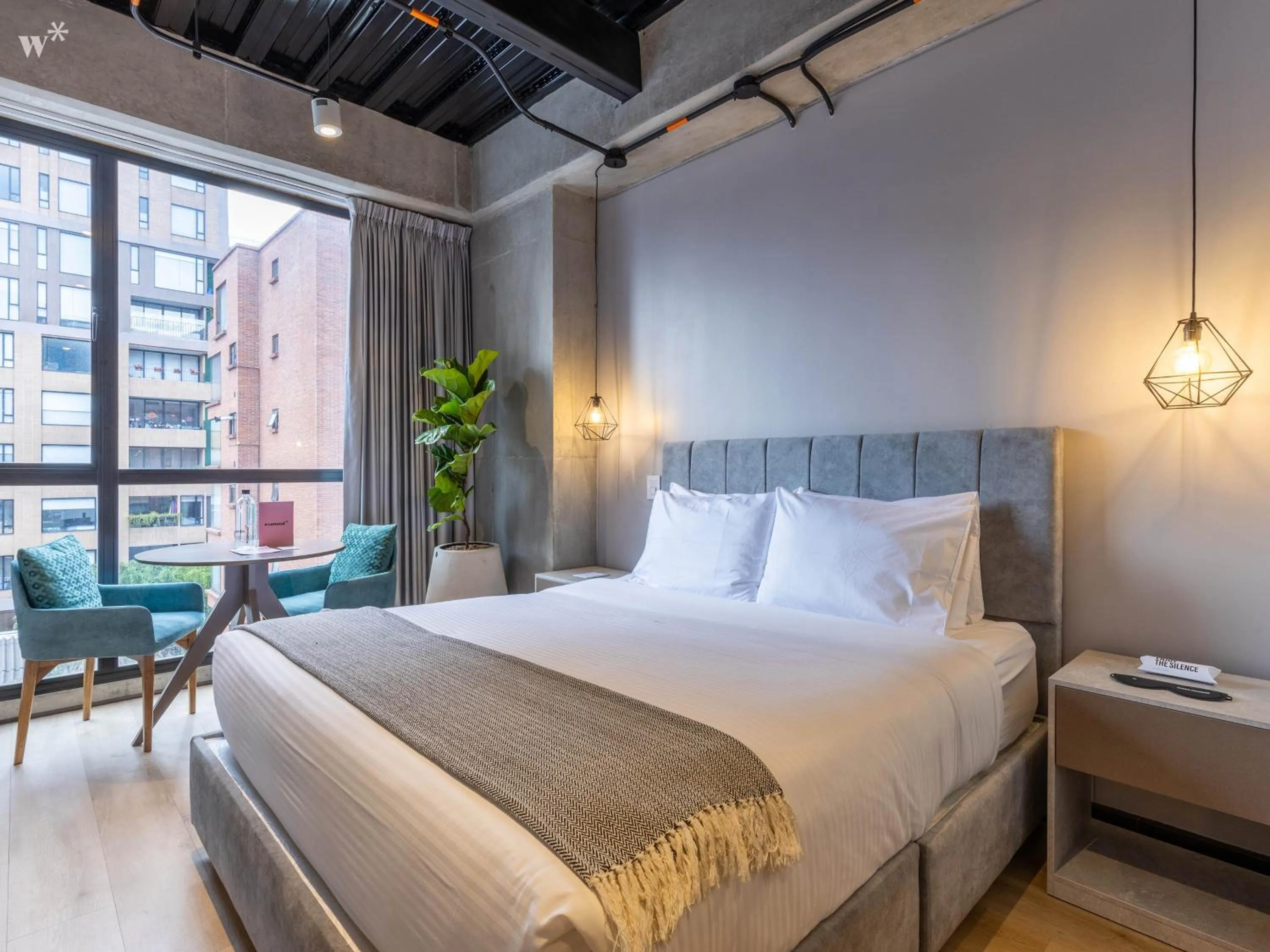 Bed in Beliving by Wynwood House