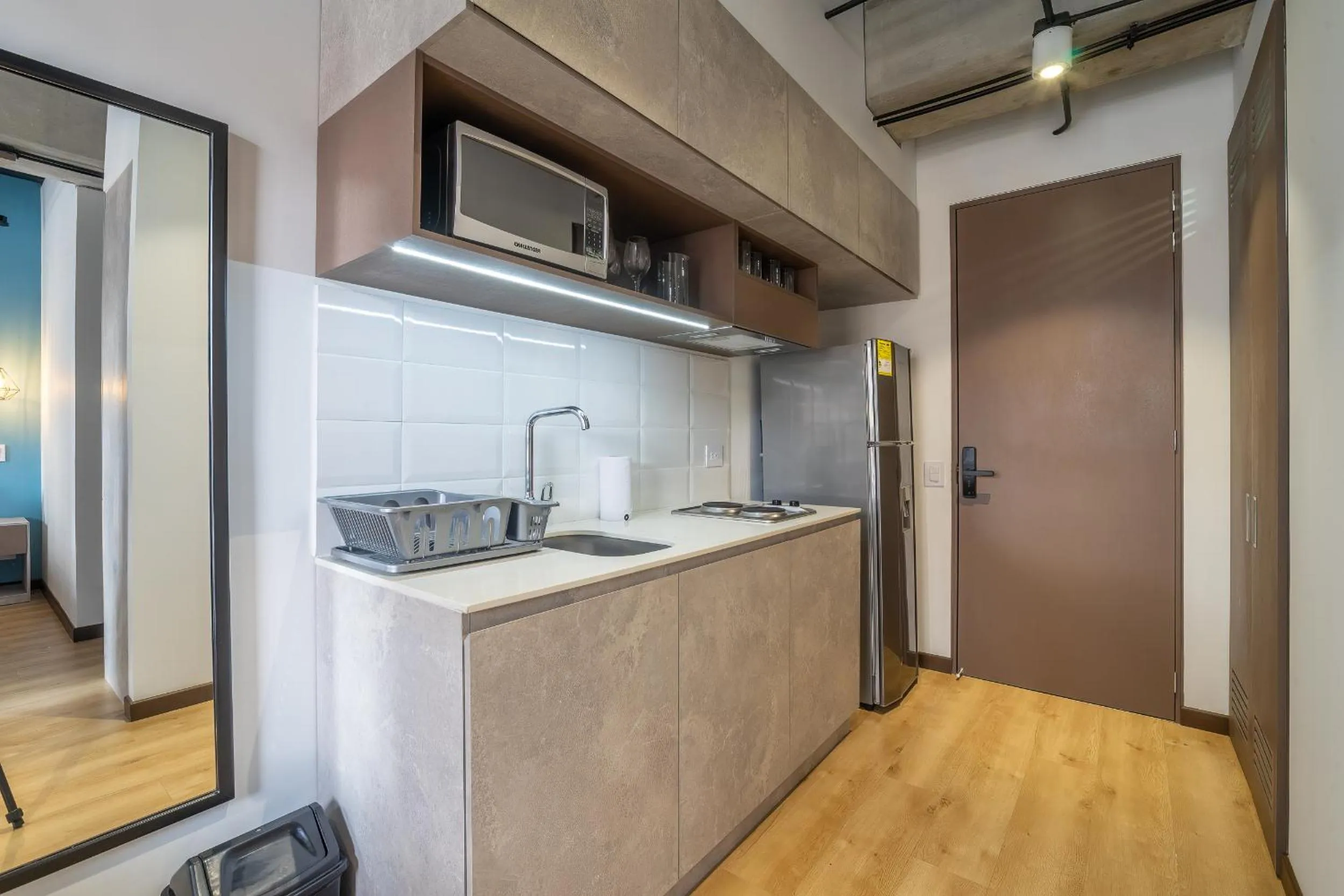 Kitchen or kitchenette in Beliving by Wynwood House