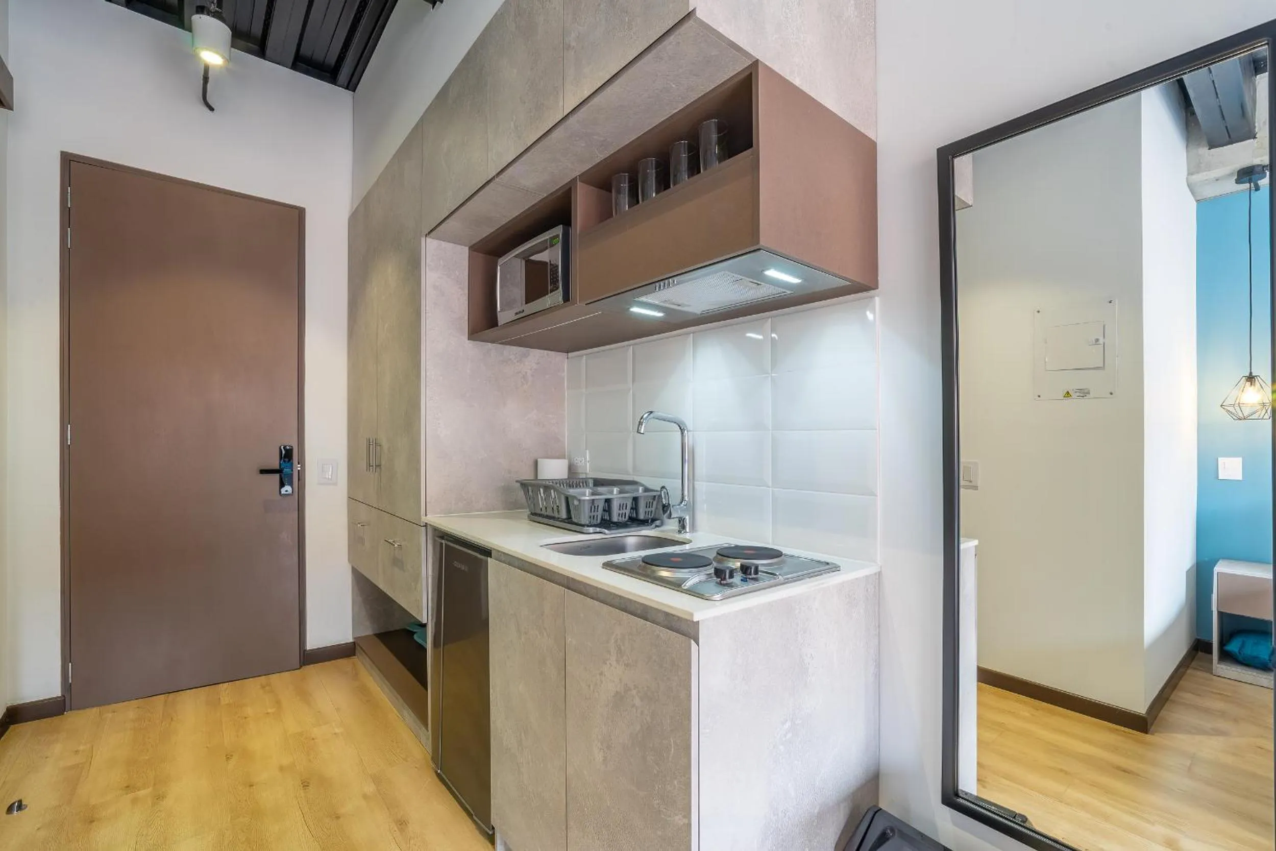 Kitchen or kitchenette in Beliving by Wynwood House