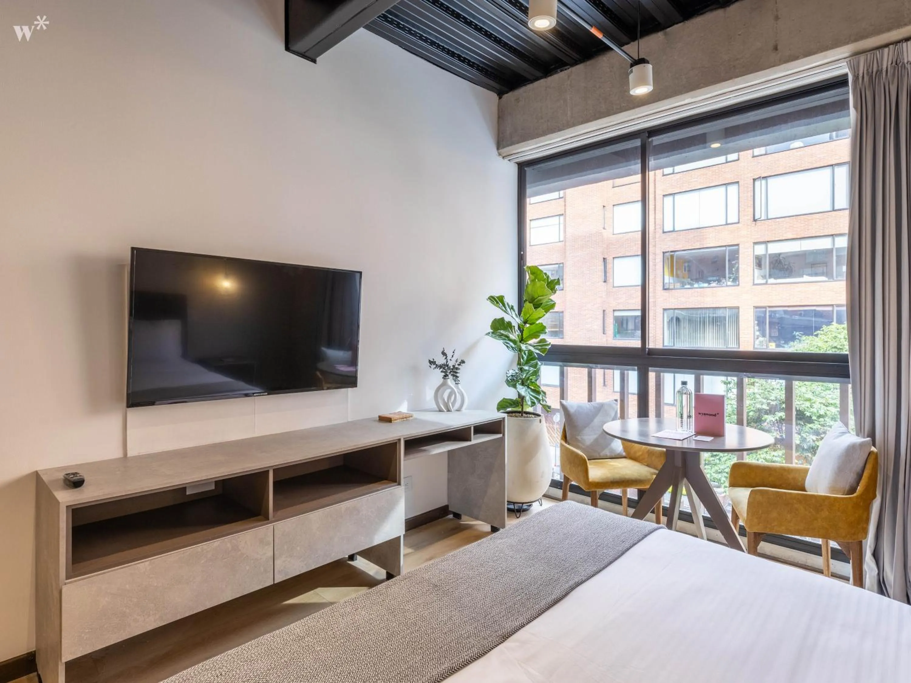 Bed in Beliving by Wynwood House