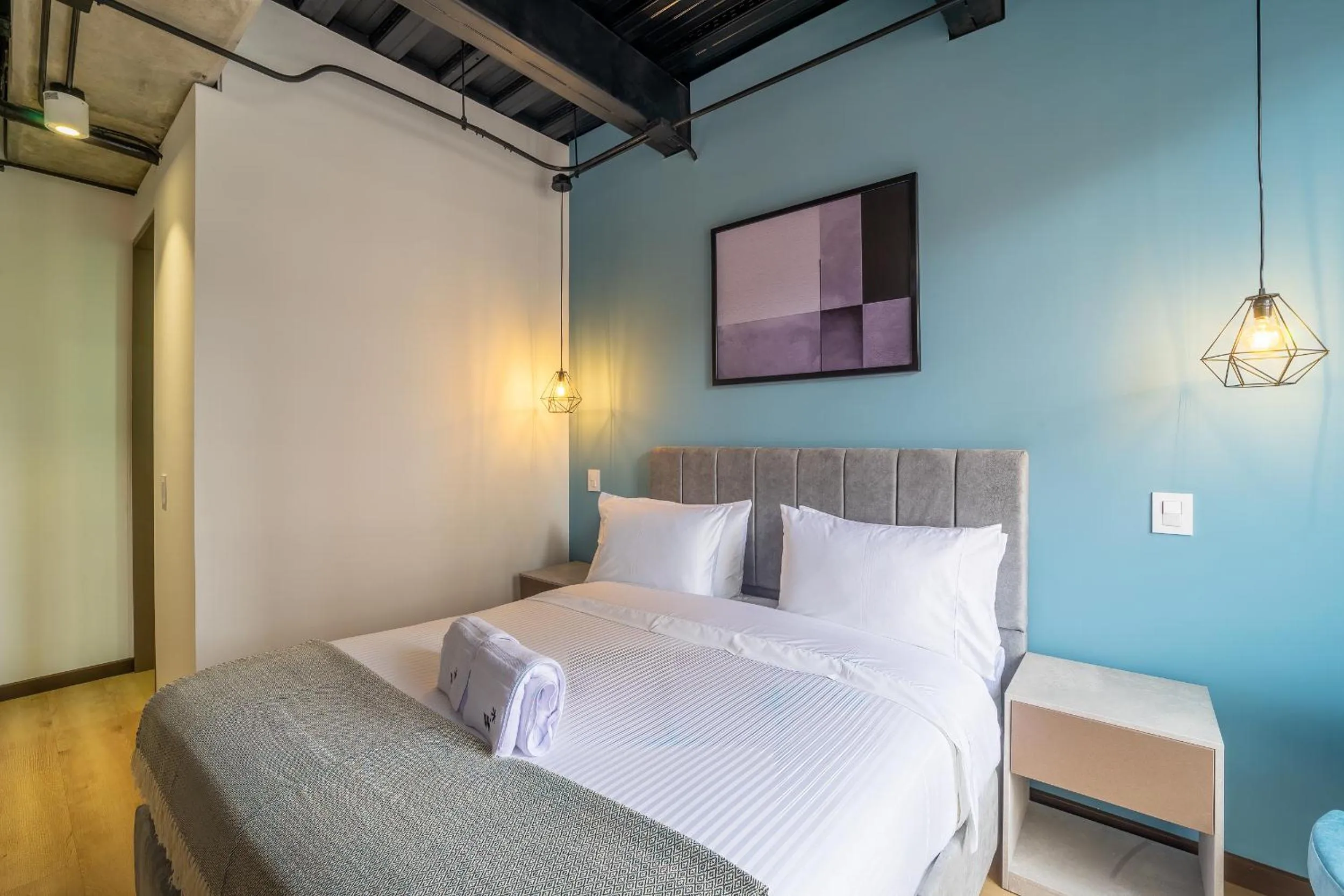 Bed in Beliving by Wynwood House