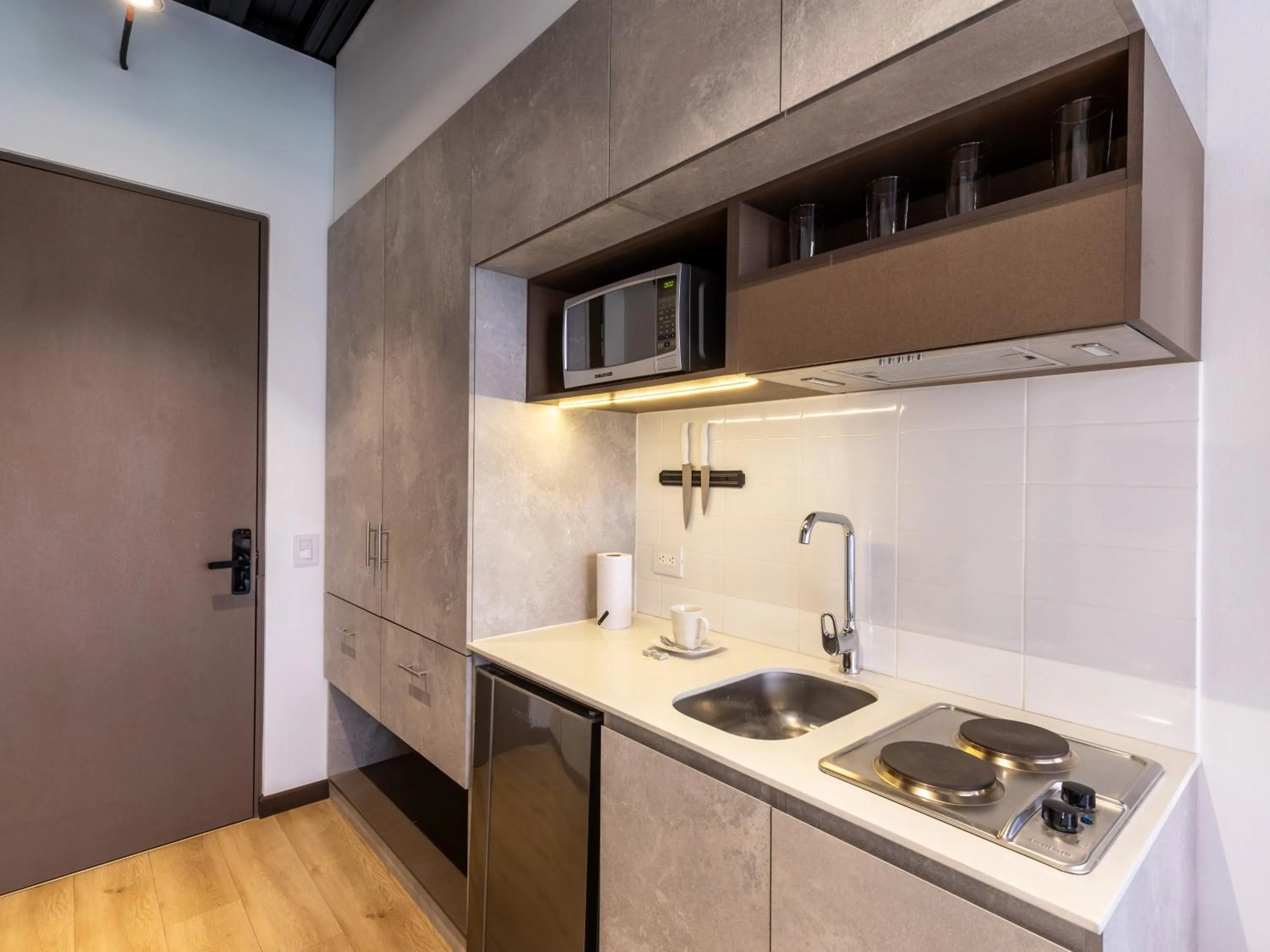 Kitchen or kitchenette in Beliving by Wynwood House