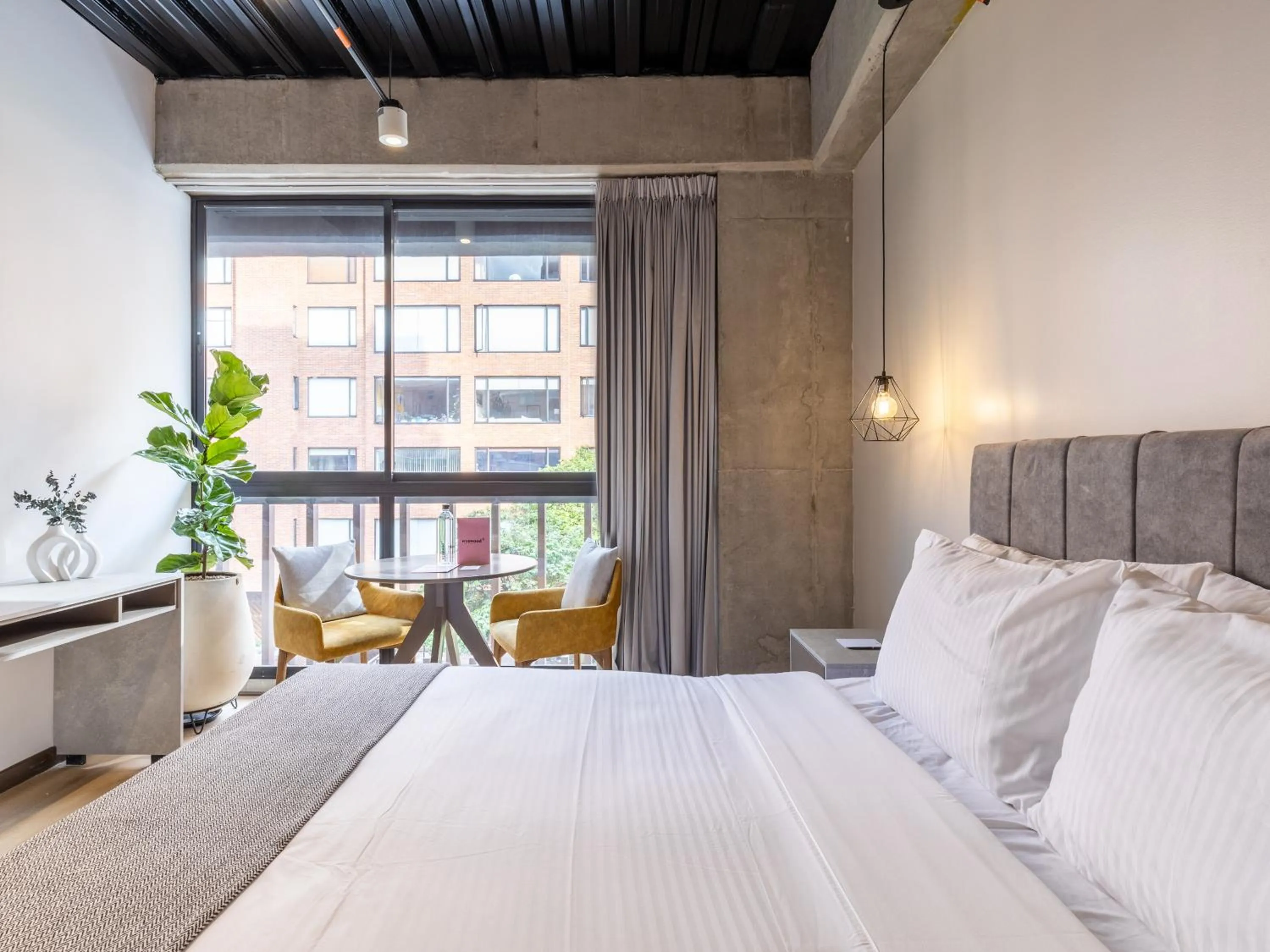 Bed in Beliving by Wynwood House