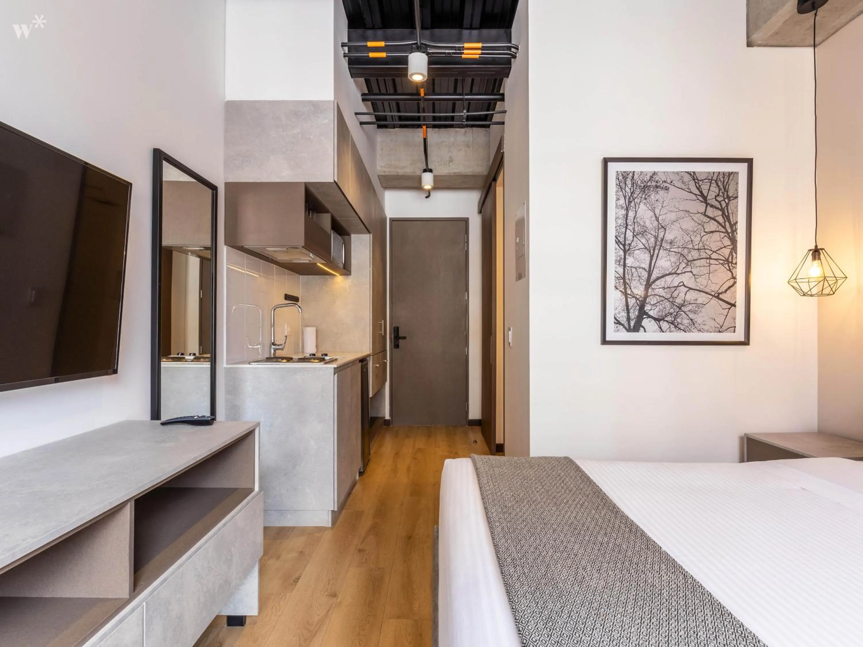 Bed in Beliving by Wynwood House