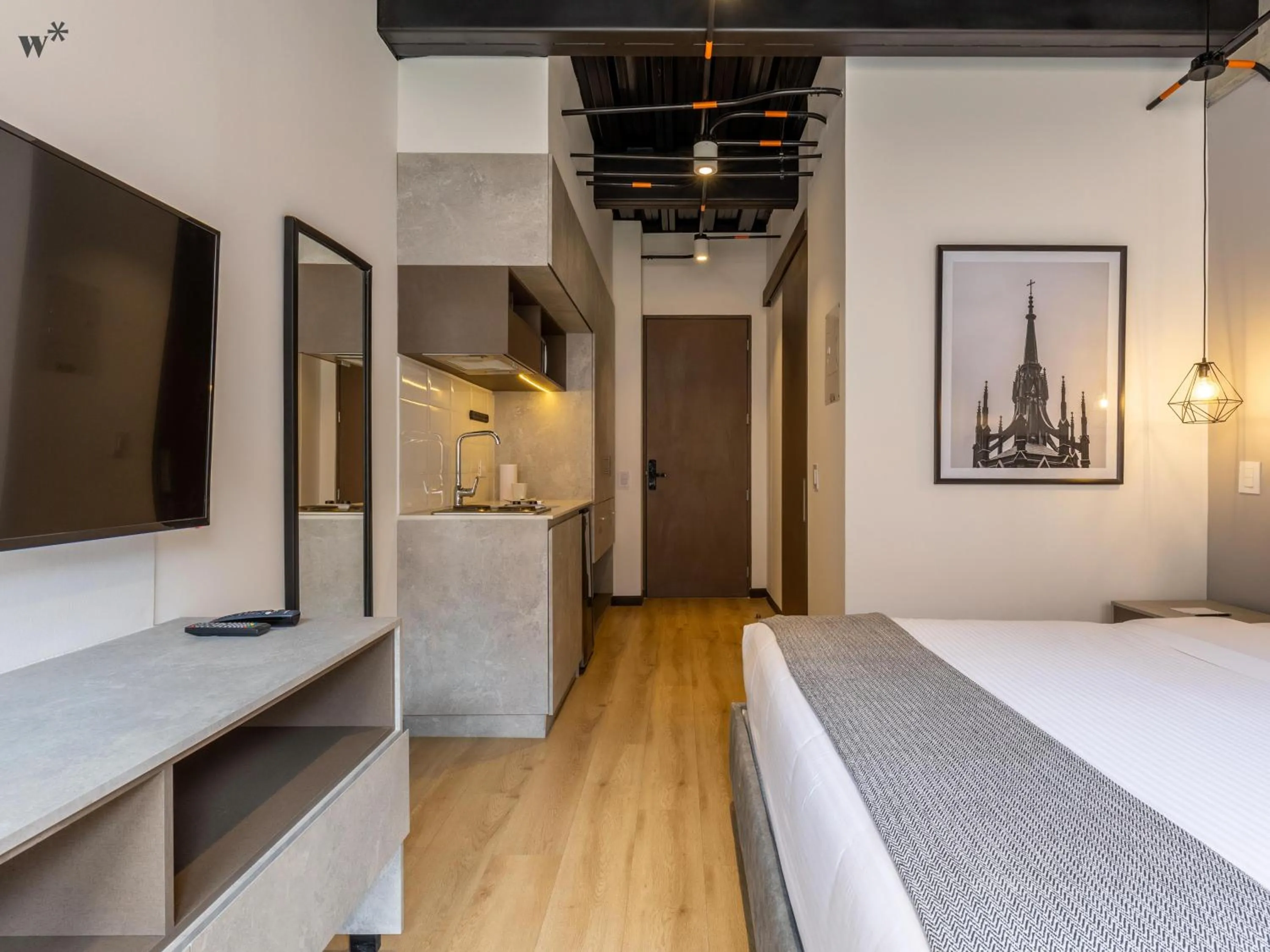 Bed in Beliving by Wynwood House