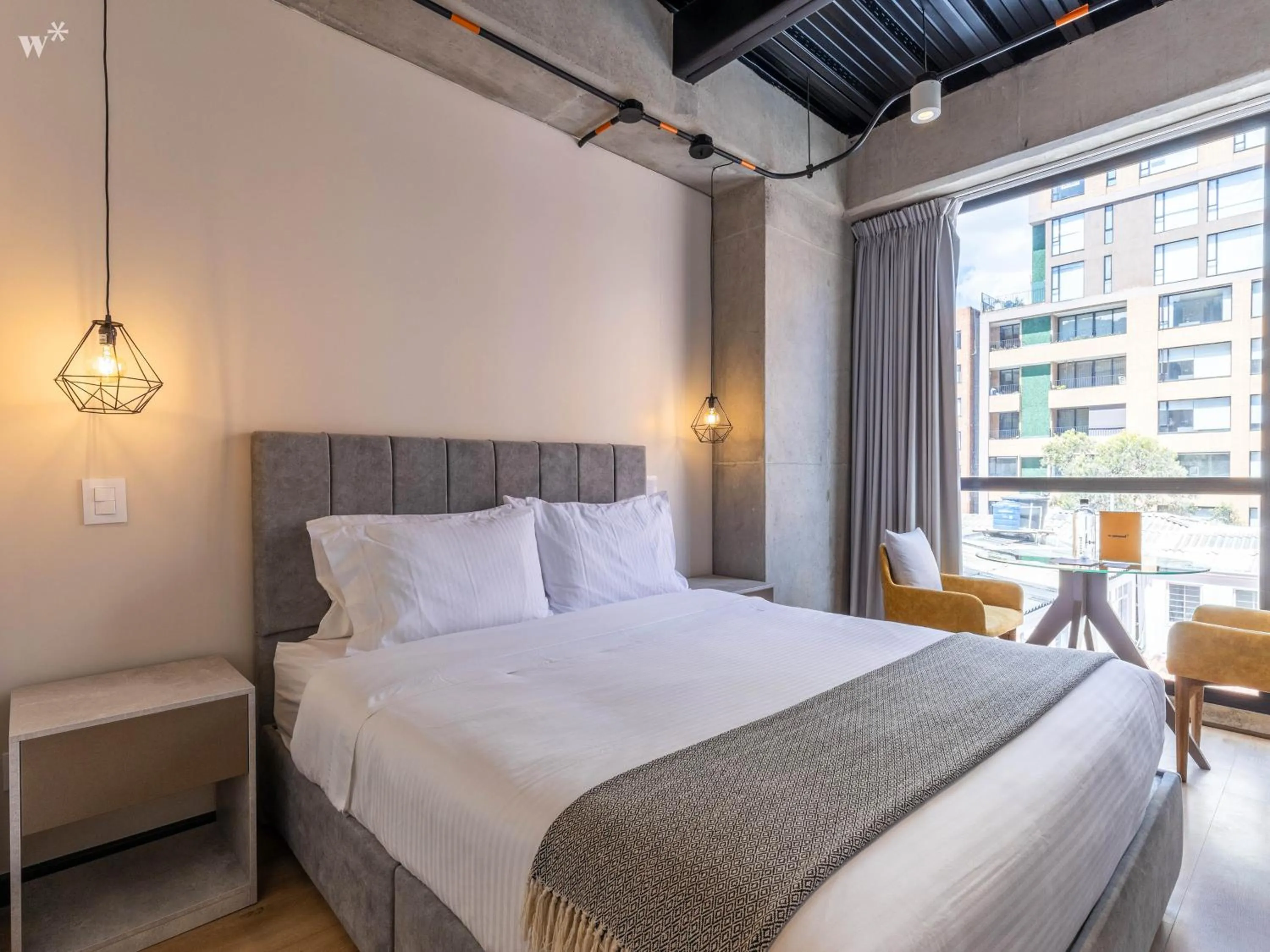 Bed in Beliving by Wynwood House