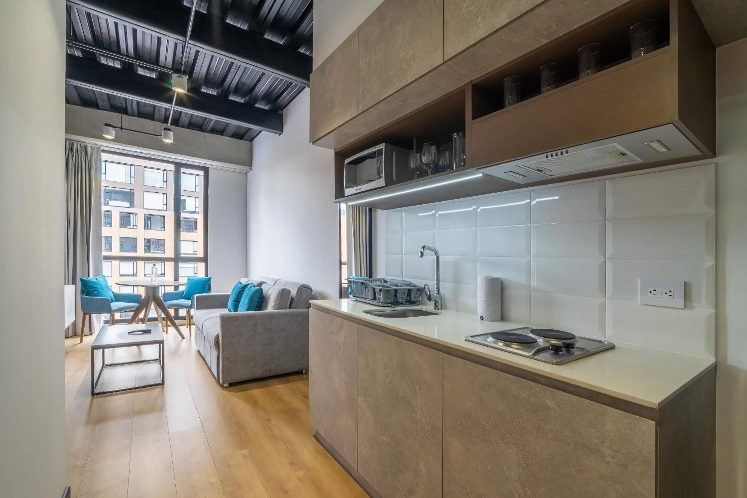Kitchen or kitchenette in Beliving by Wynwood House