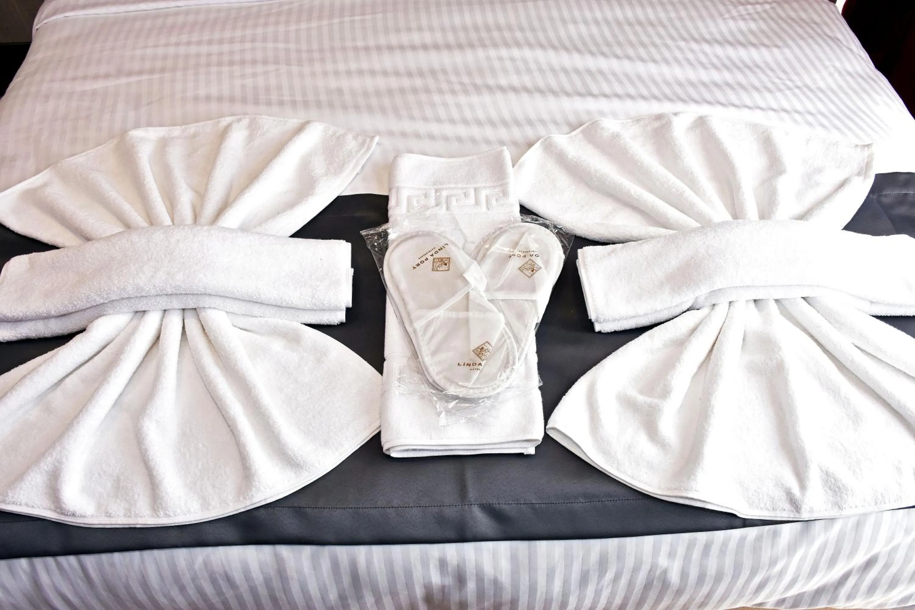 towels, Bed in Linda Port Hotel