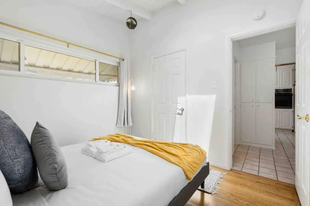 Bed in Mid Century Garden View Home Parking